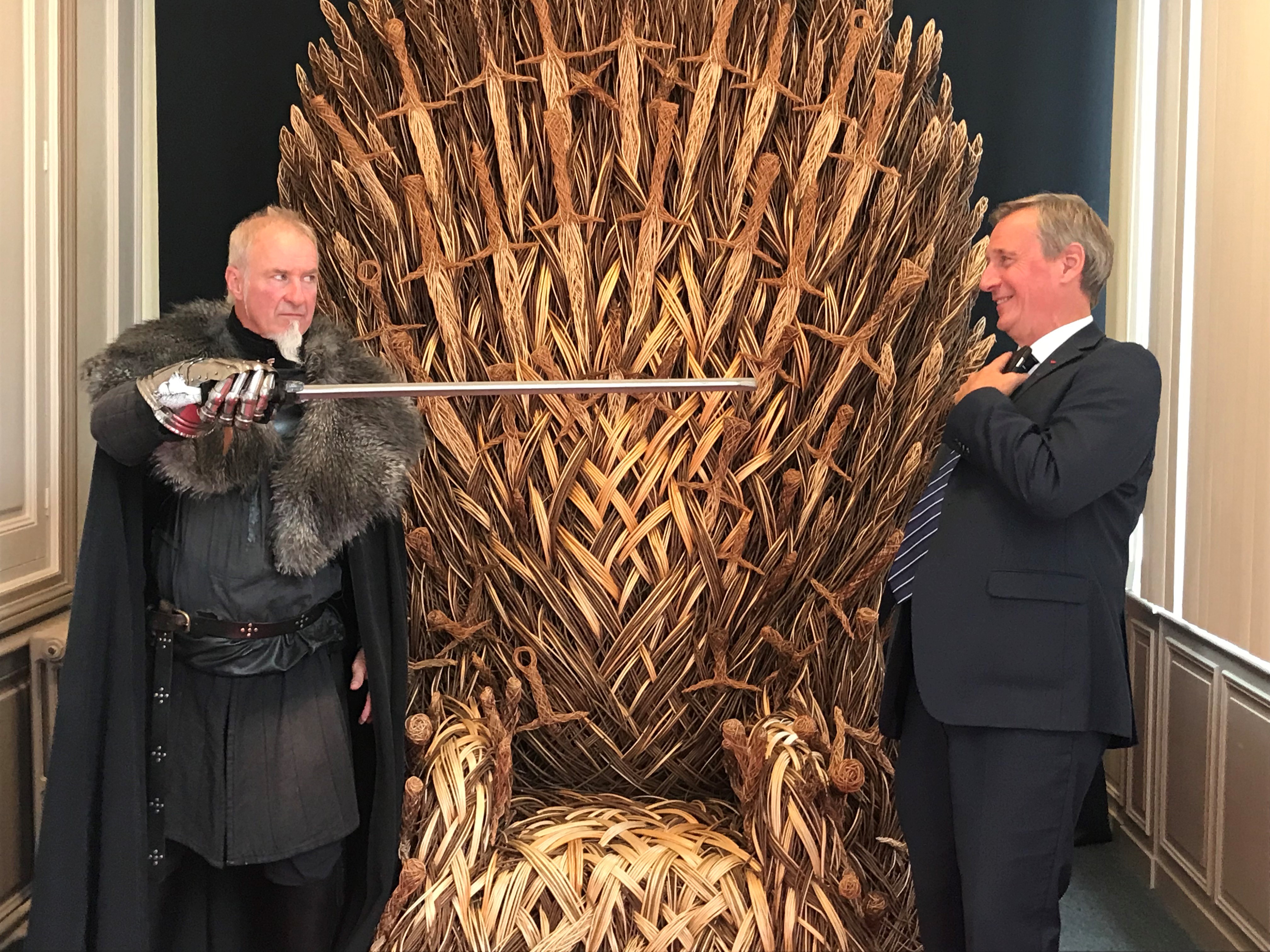 Mayor of Bayeux Patrick Gomont meets one of the Game Of Thrones extras at the unveiling of the Game of Thrones tapestry (Rebecca Black/PA)