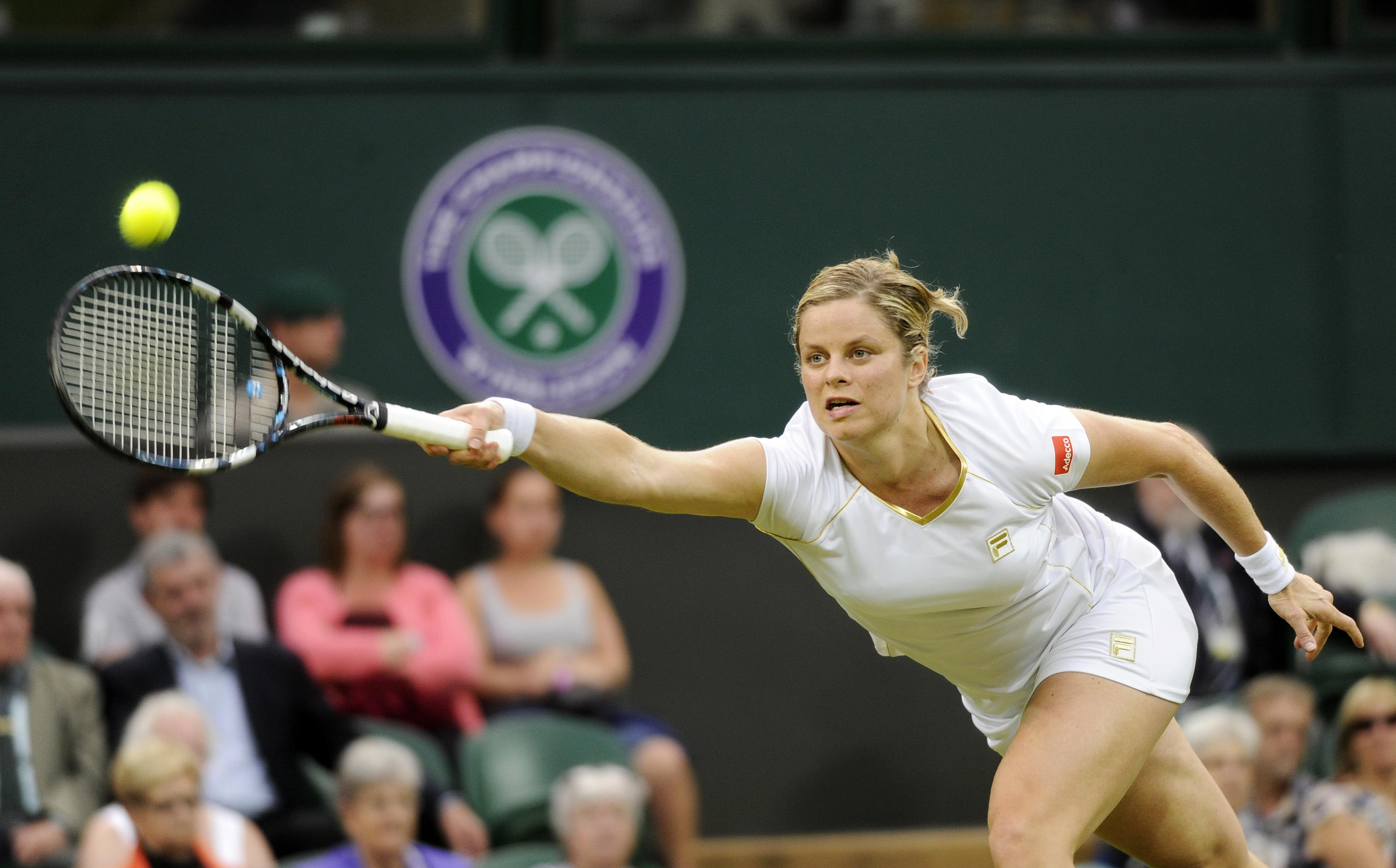 Belgium's Kim Clijsters in action against Czech Republic's Andrea Hlavackova during day three of the 2012 Wimbledon Championships