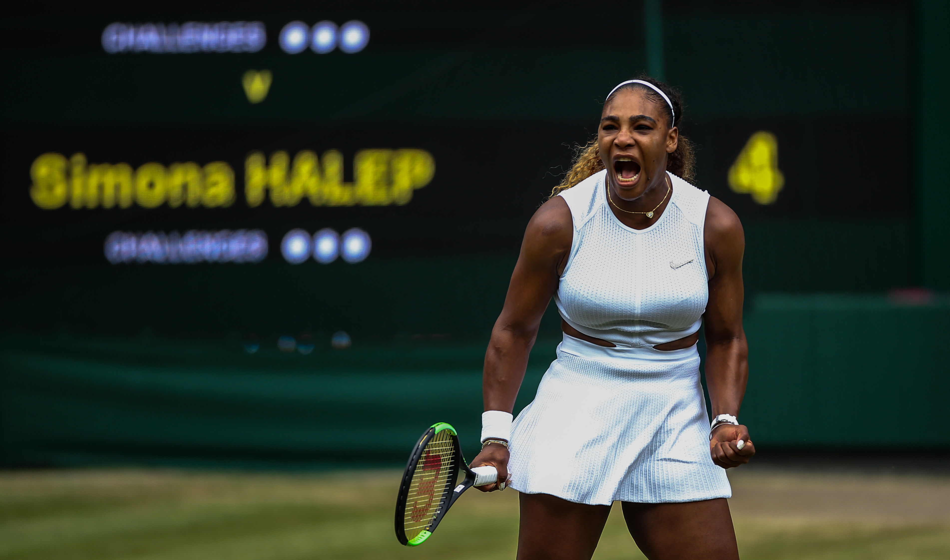 Serena Williams reacts during the women's singles final on day twelve of the Wimbledon Championships at the All England Lawn Tennis and Croquet Club, Wimbledo