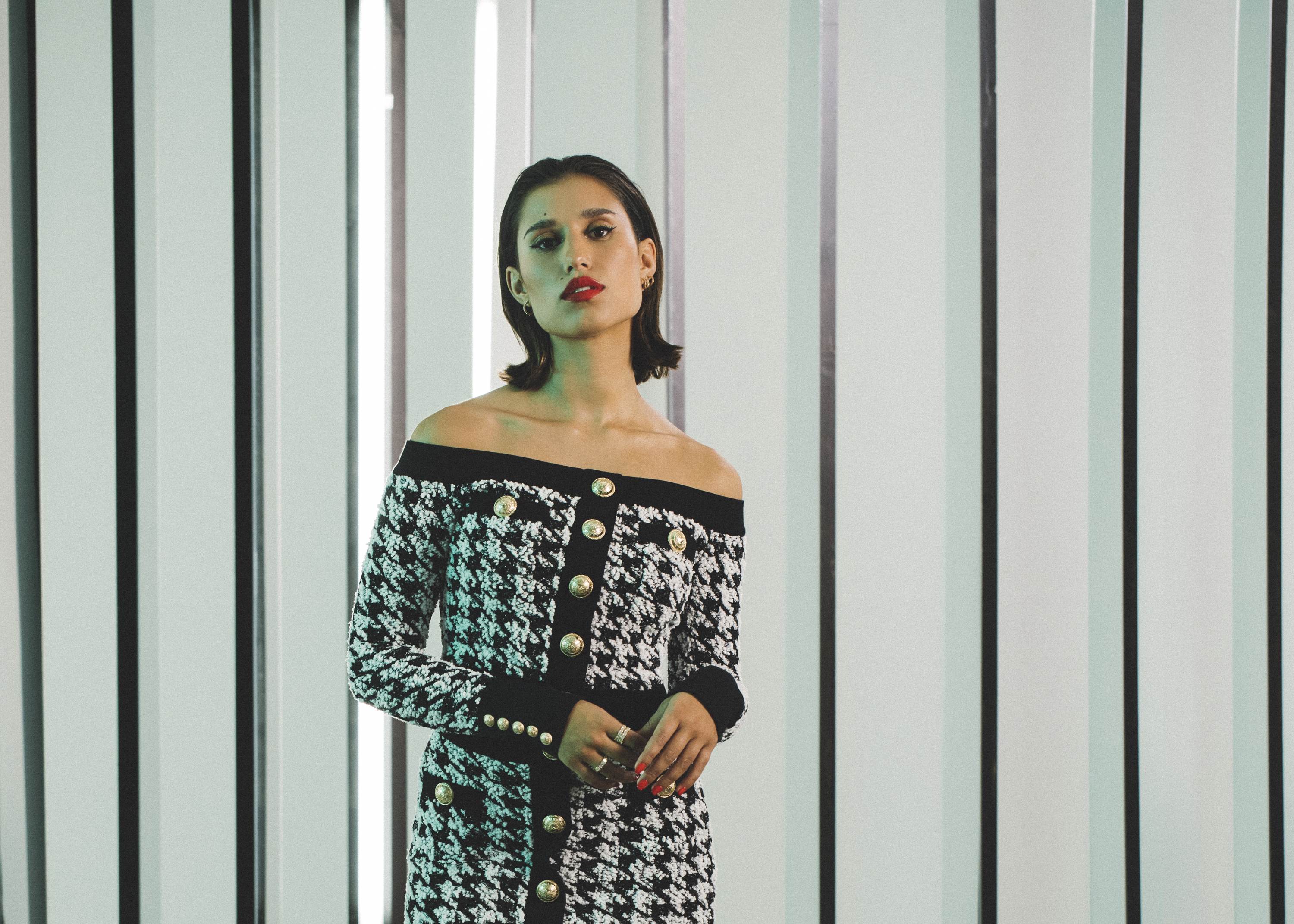 Raye wearing Flannels AW19 collection