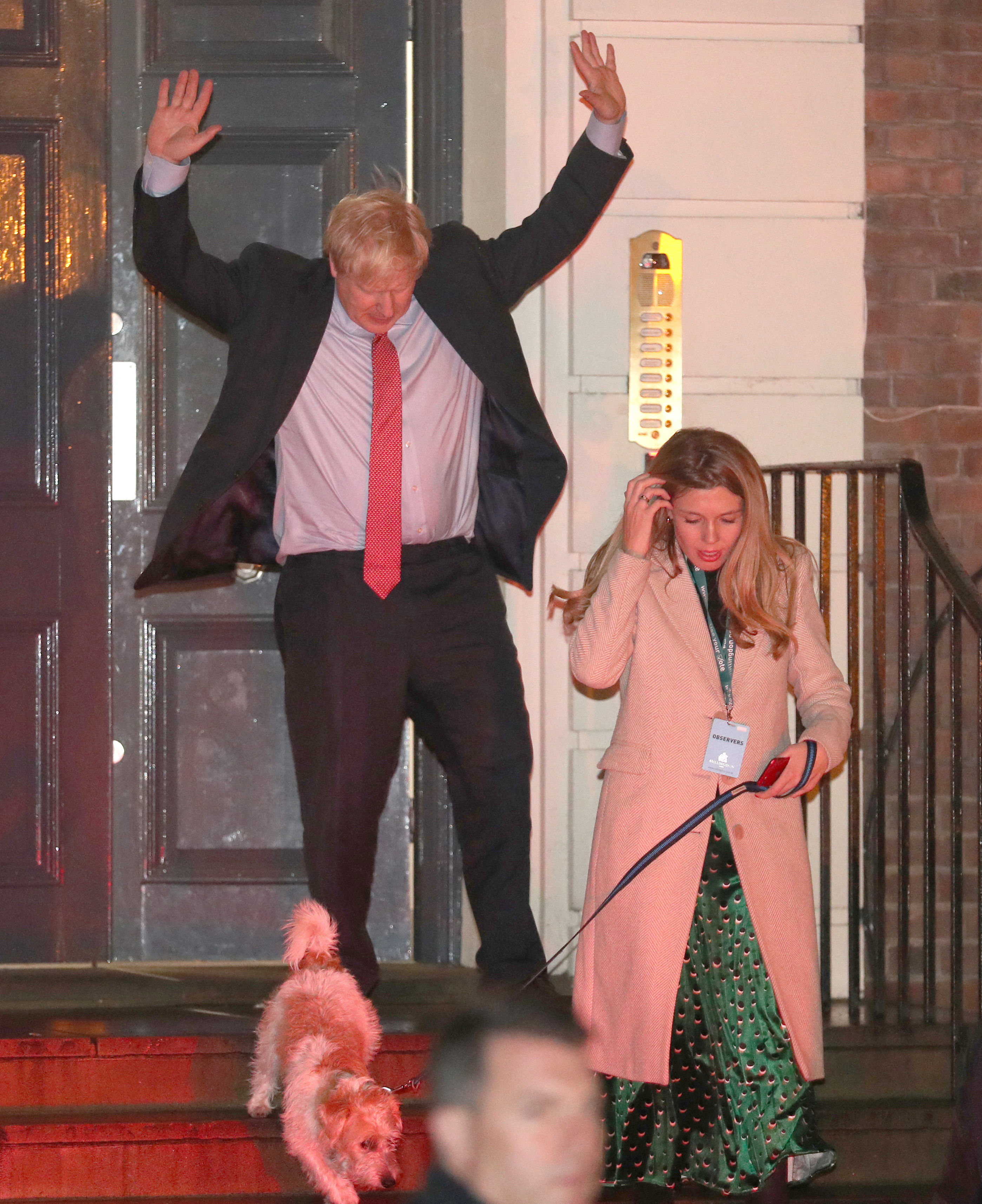 Prime Minister Boris Johnson leaving Conservative Party Headquarters, with with partner Carrie Symonds and dog Dilyn in central London as his party romped to victory in the 2019 General Election. (Andrew Matthews/PA)