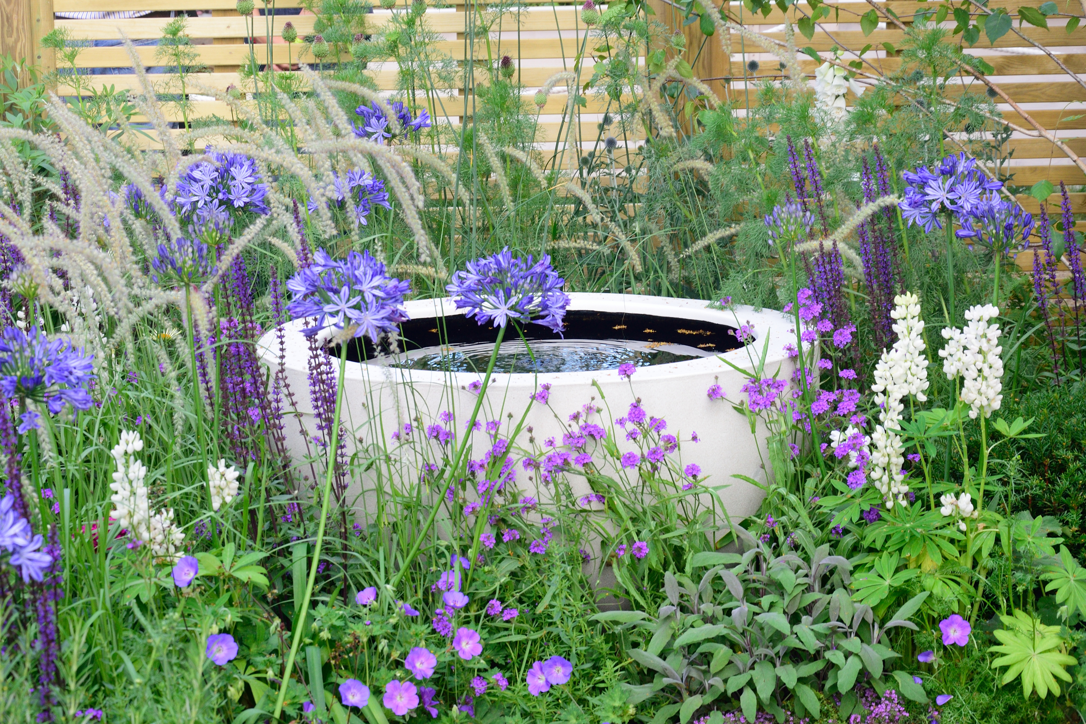 You can create eye-catching surprises like this water feature in odd-shaped gardens (iStock/PA)