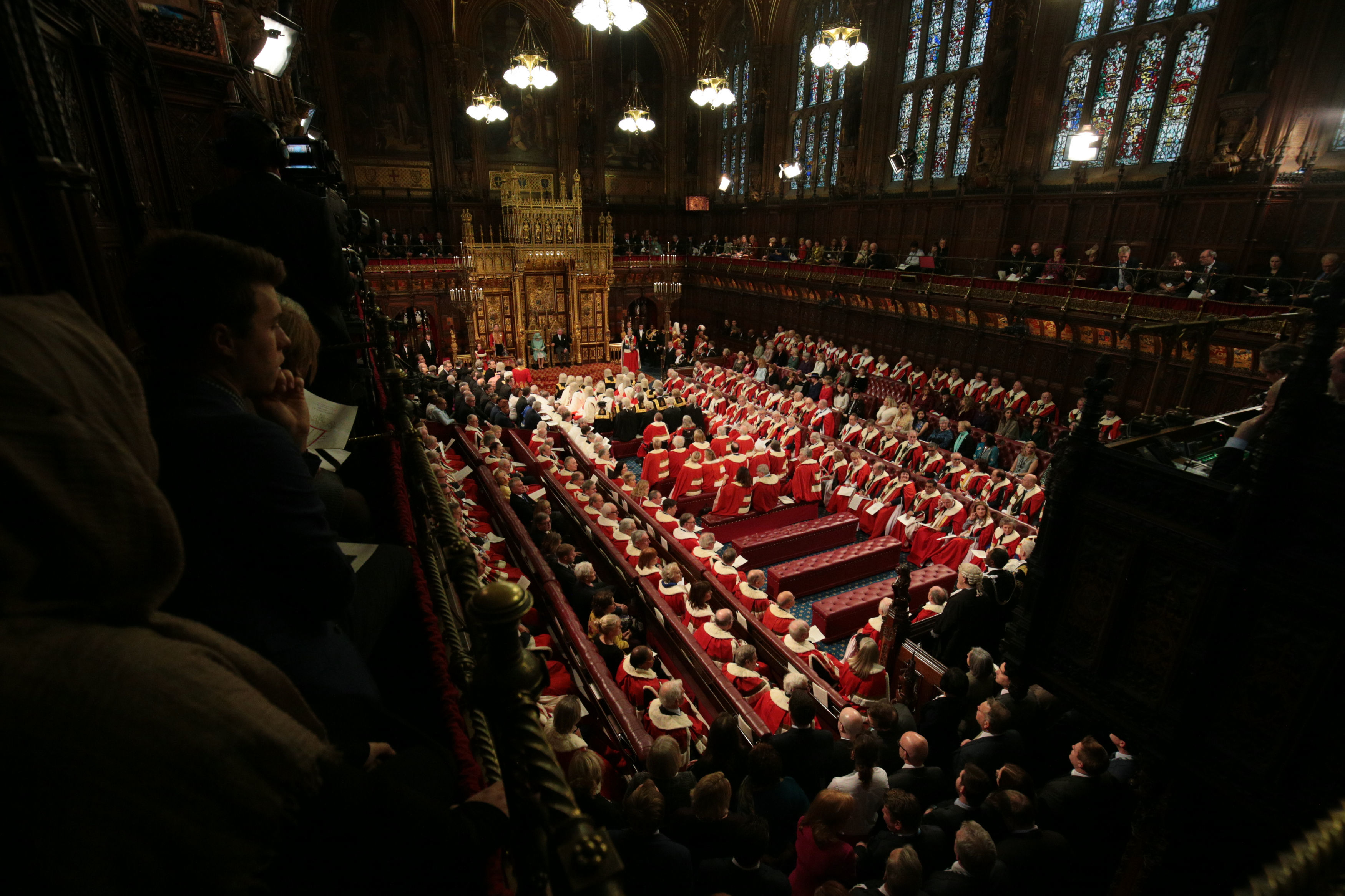 Queen Elizabeth II, the Prince of Wales and members and guests sit in the chamber during the State Opening of Parliament by the Queen, in the House of Lords at the Palace of Westminster in London. (Aaron Chown/PA)