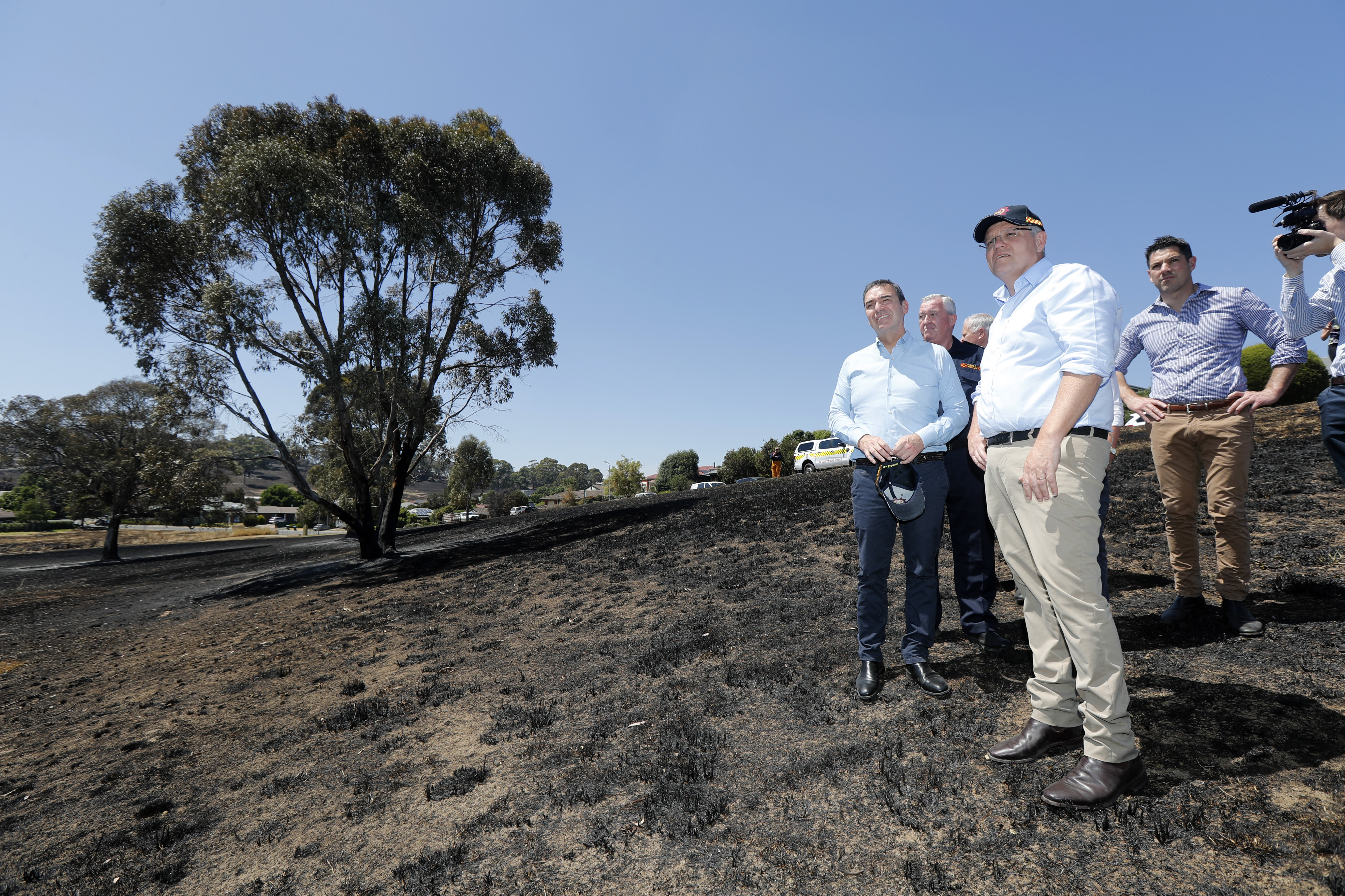 Australian Prime Minister Scott Morrison, front, in Woodside in South Australia