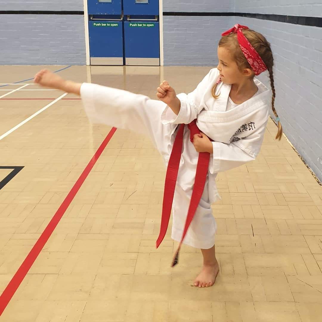 Karate kid born with rare condition defies the odds to win medal.