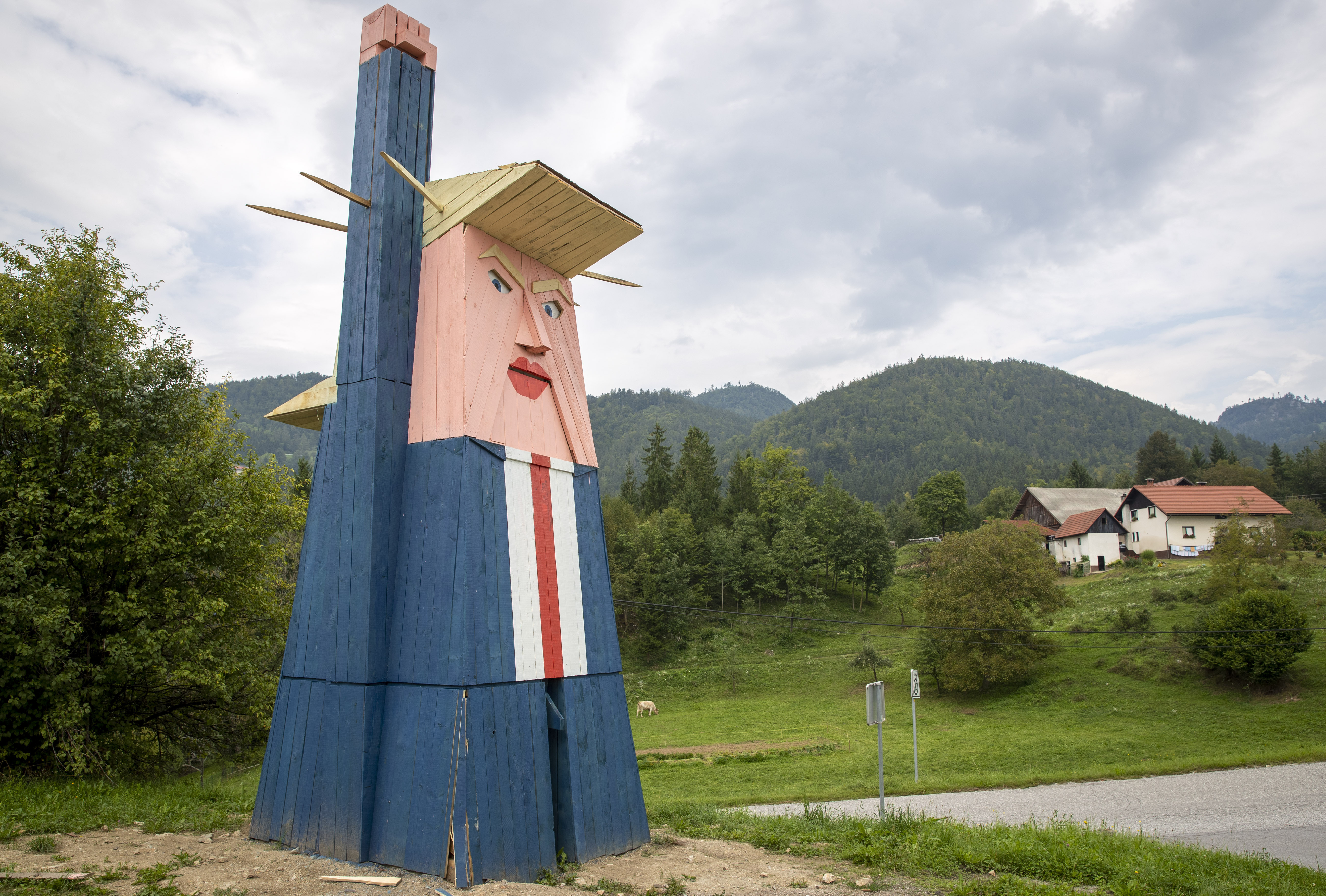A wooden statue resembling Donald Trump near Kamnik, Slovenia
