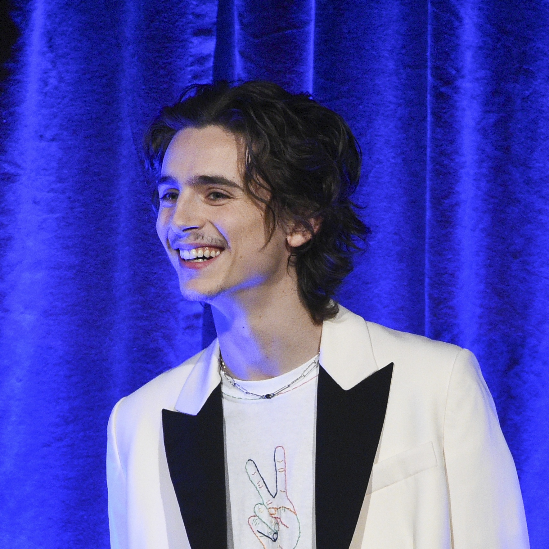 Timothee Chalamet debuts new facial hair at New York event