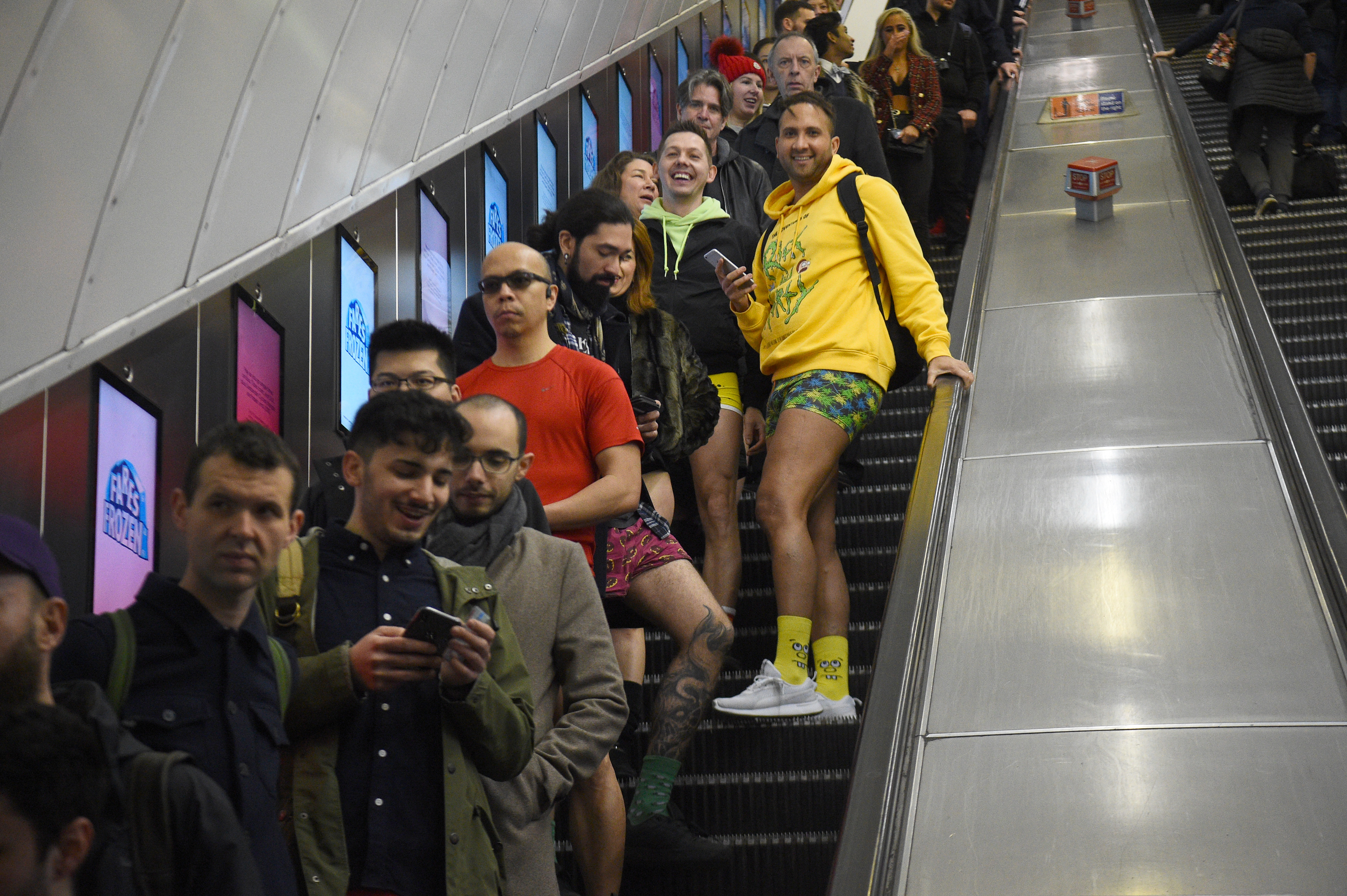 People take part in the 11th annual No Trousers Tube Ride in London.