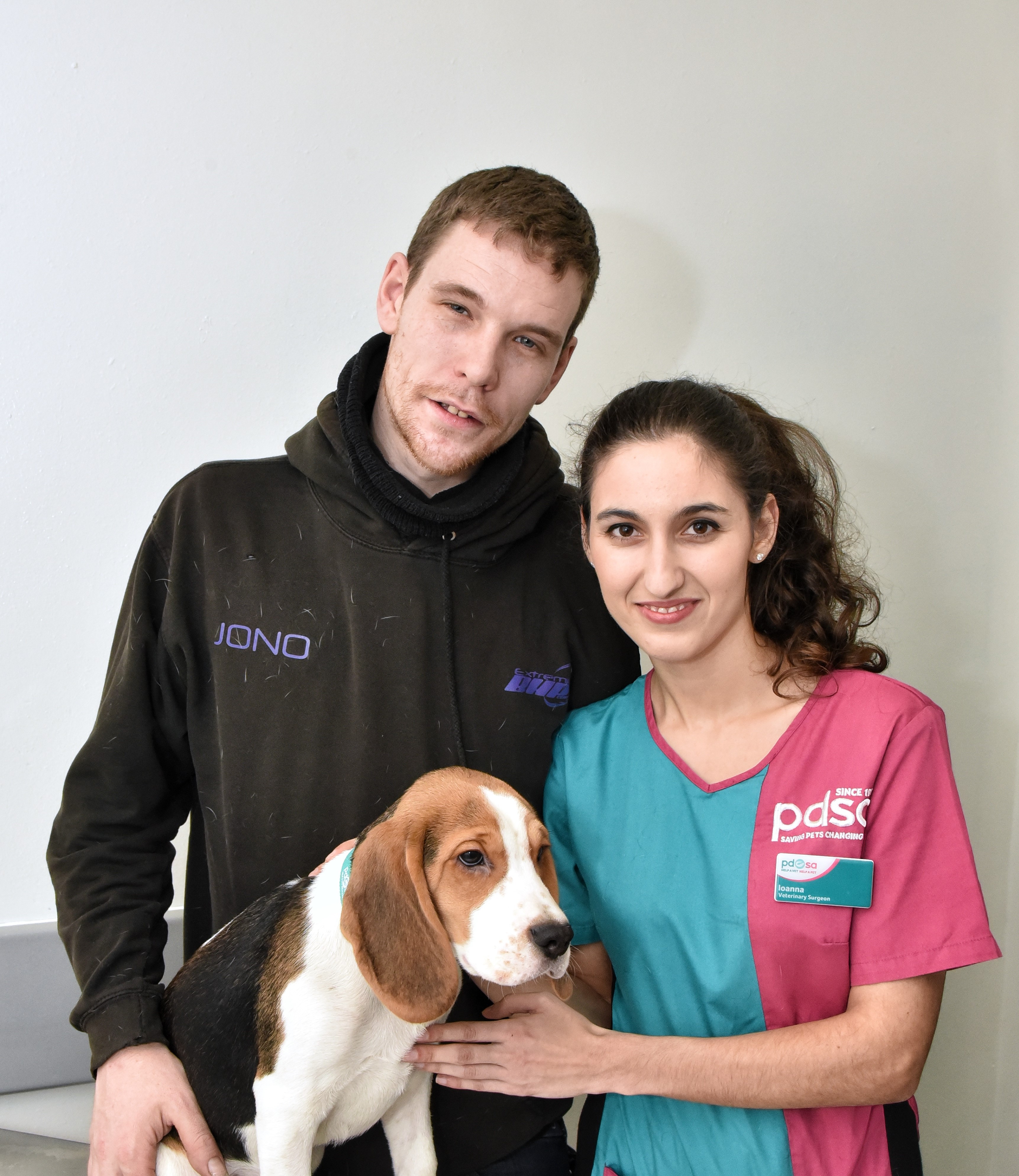 Bandit with owner Jonathan Collinge and PDSA vet Ioanna Antonopoulou (Julian Brown PDSA/PA)