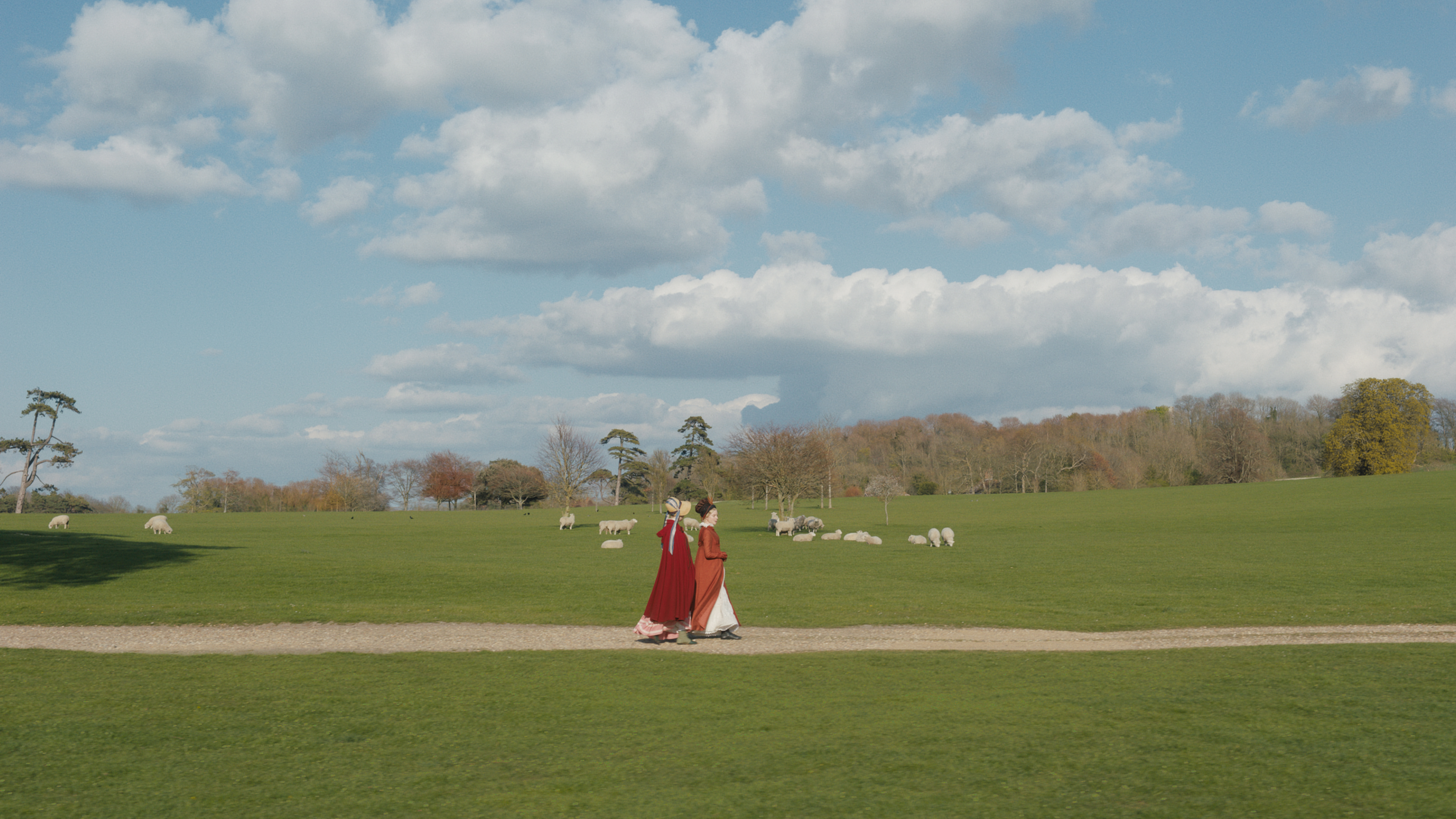 Mia Goth and Anya Taylor-Smith amidst the lambs in Emma