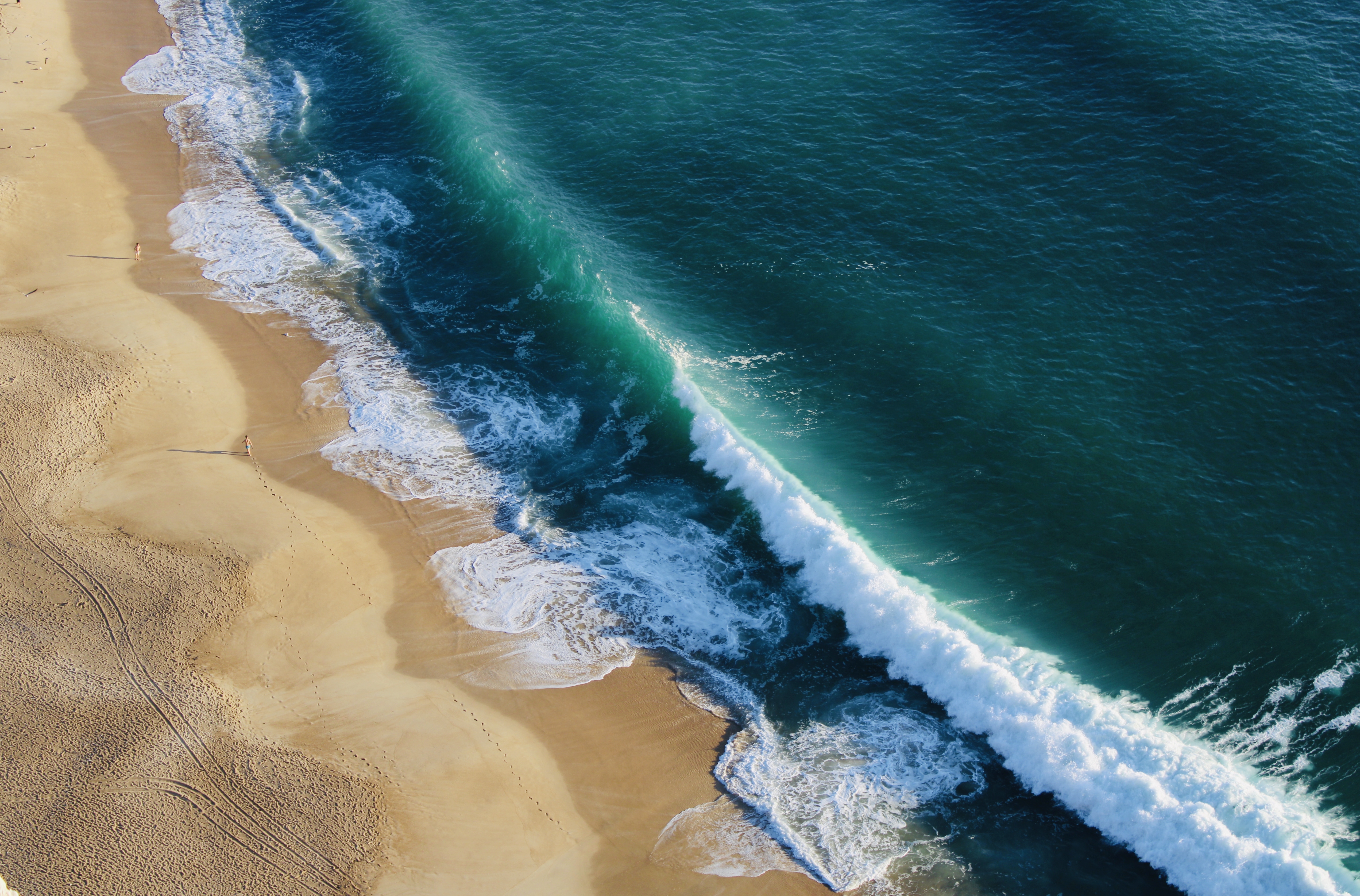 A giant wave ready to crash onto the coast of Portugal
