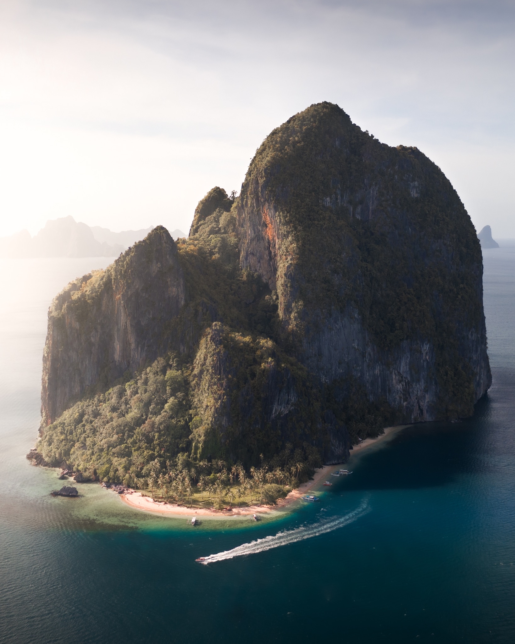 A large, forested island in the Philippines