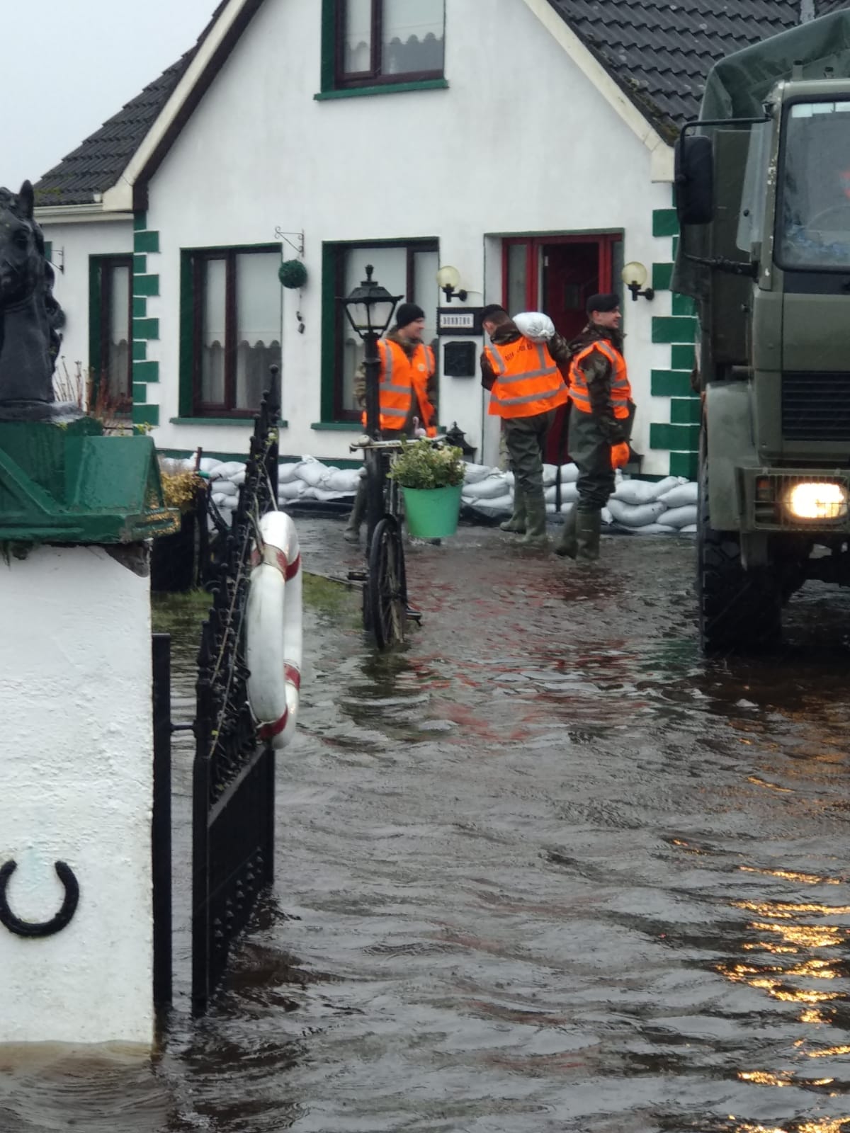 Members of the Defence Forces help with flood defences