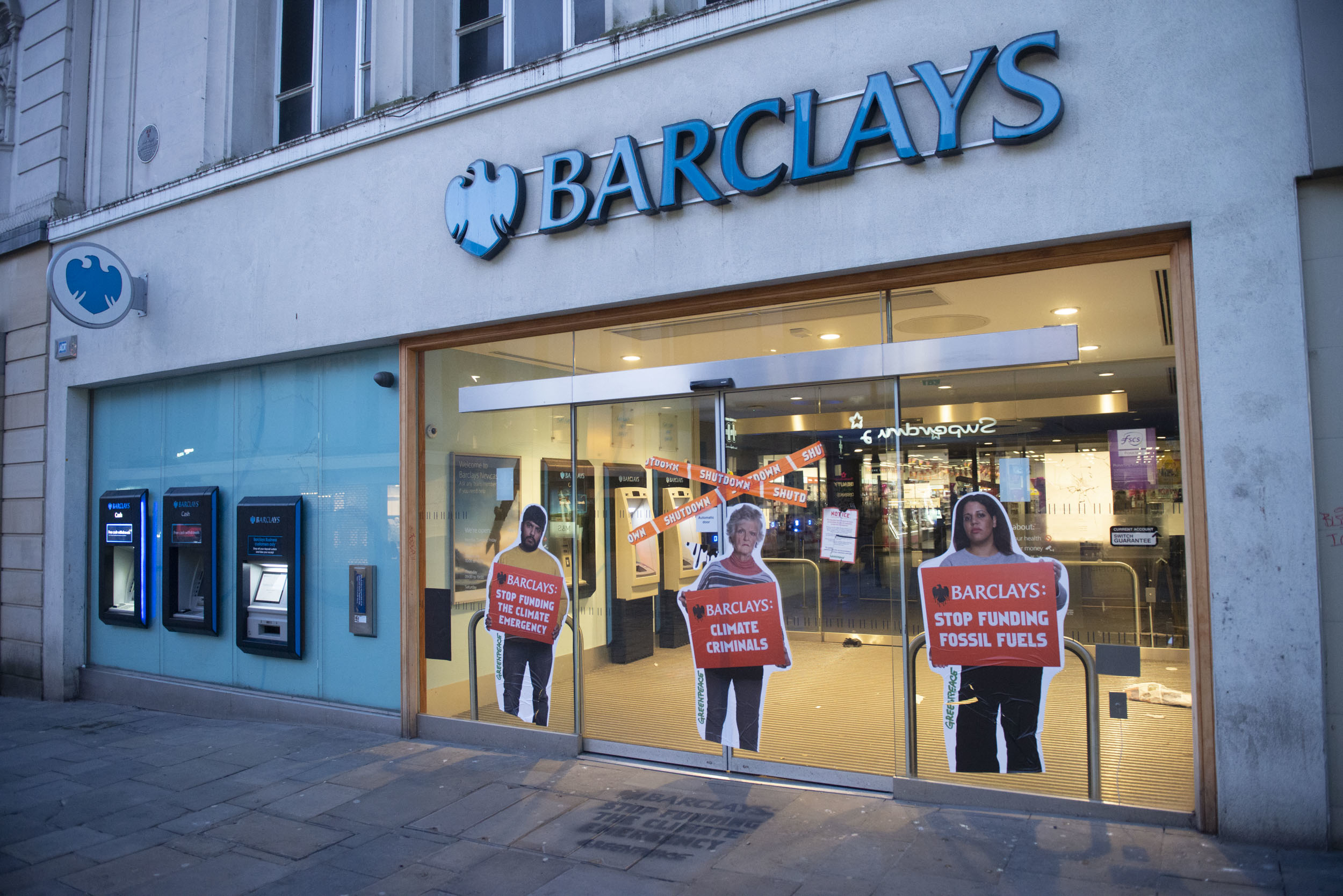 Greenpeace volunteers shut down Barclays branches in Newcastle (Tim Morozzo/Greenpeace/PA)