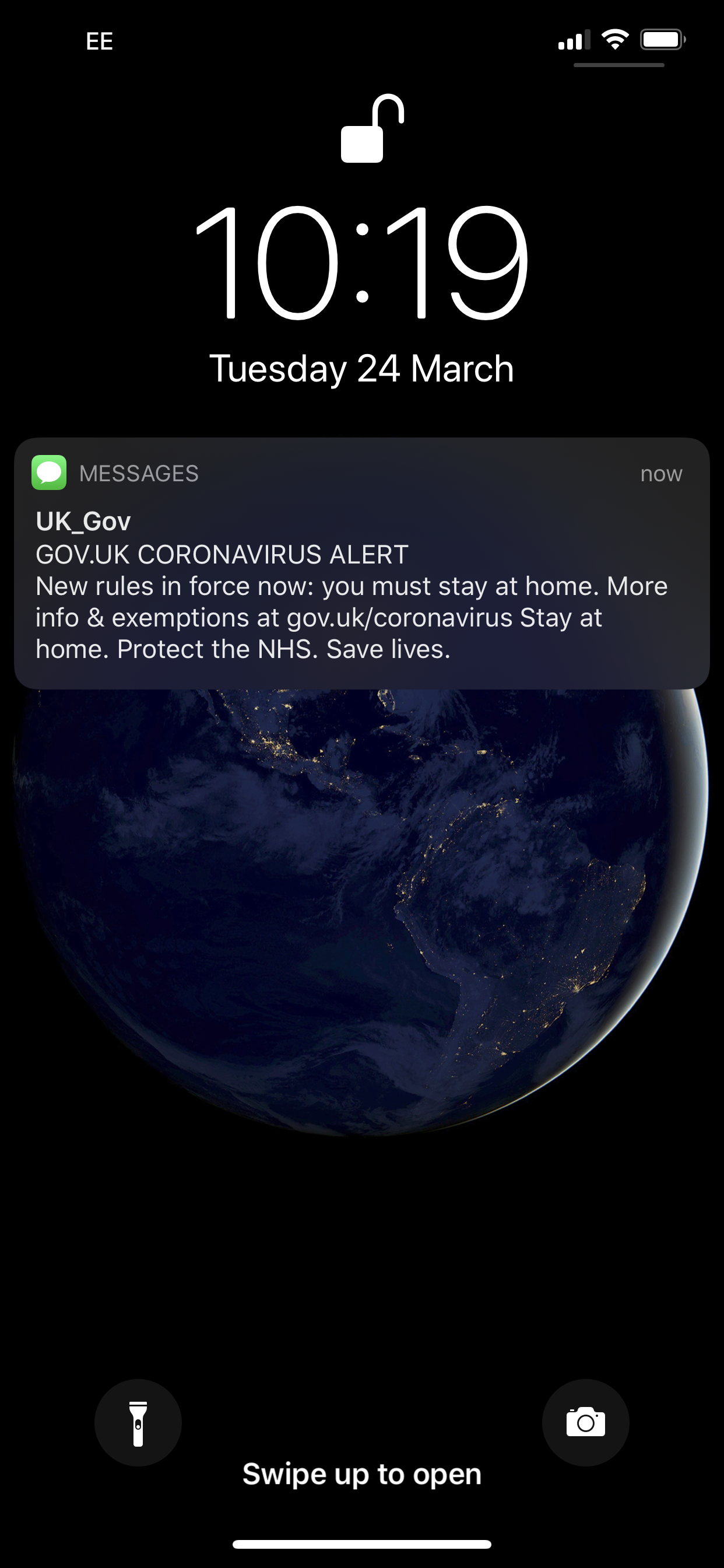 A government text message telling people to stay at home as part of new UK lockdown rules to combat the spread of Covid-19 
