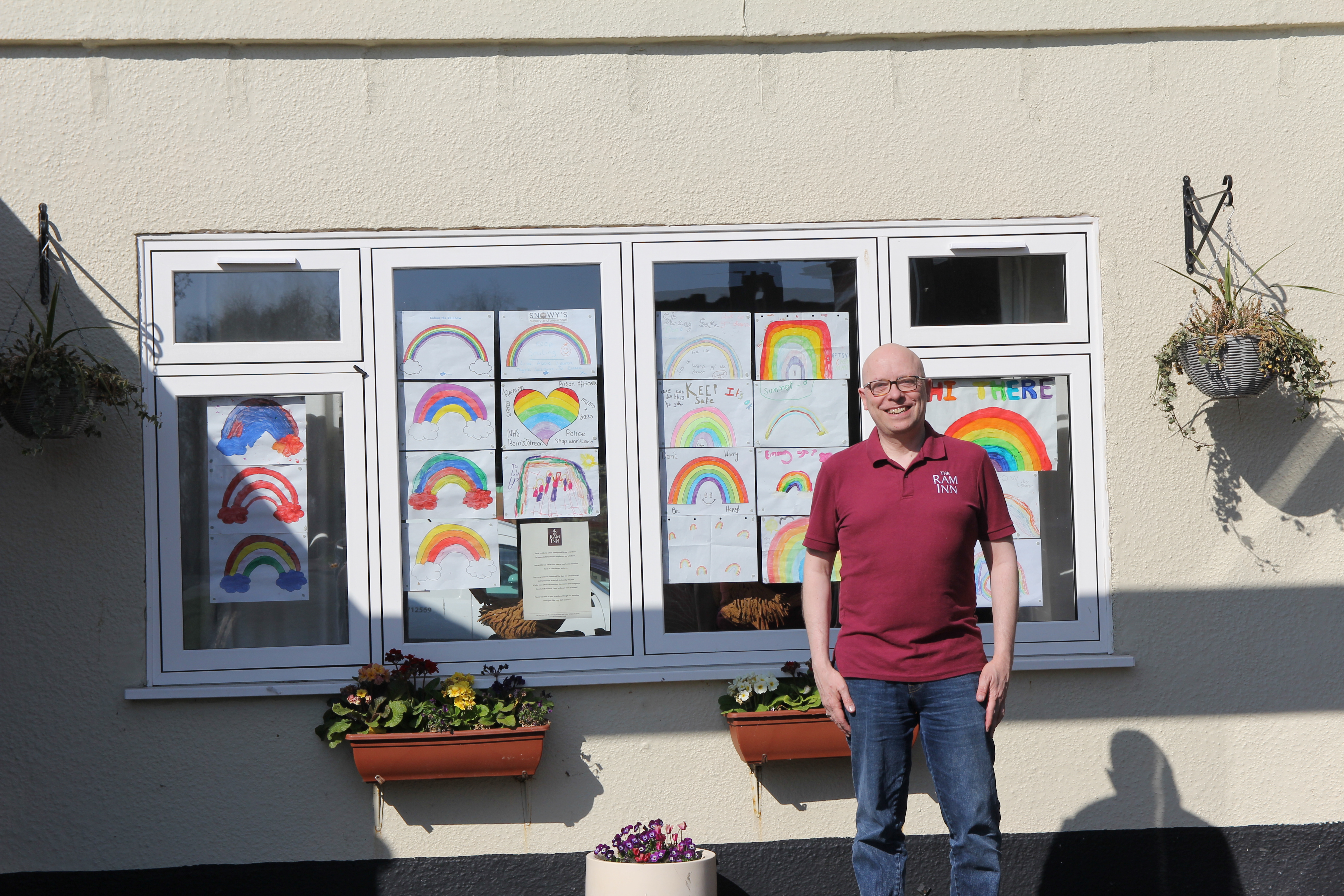 The Ram Inn in Brundall, with pictures of rainbows stuck in the windows