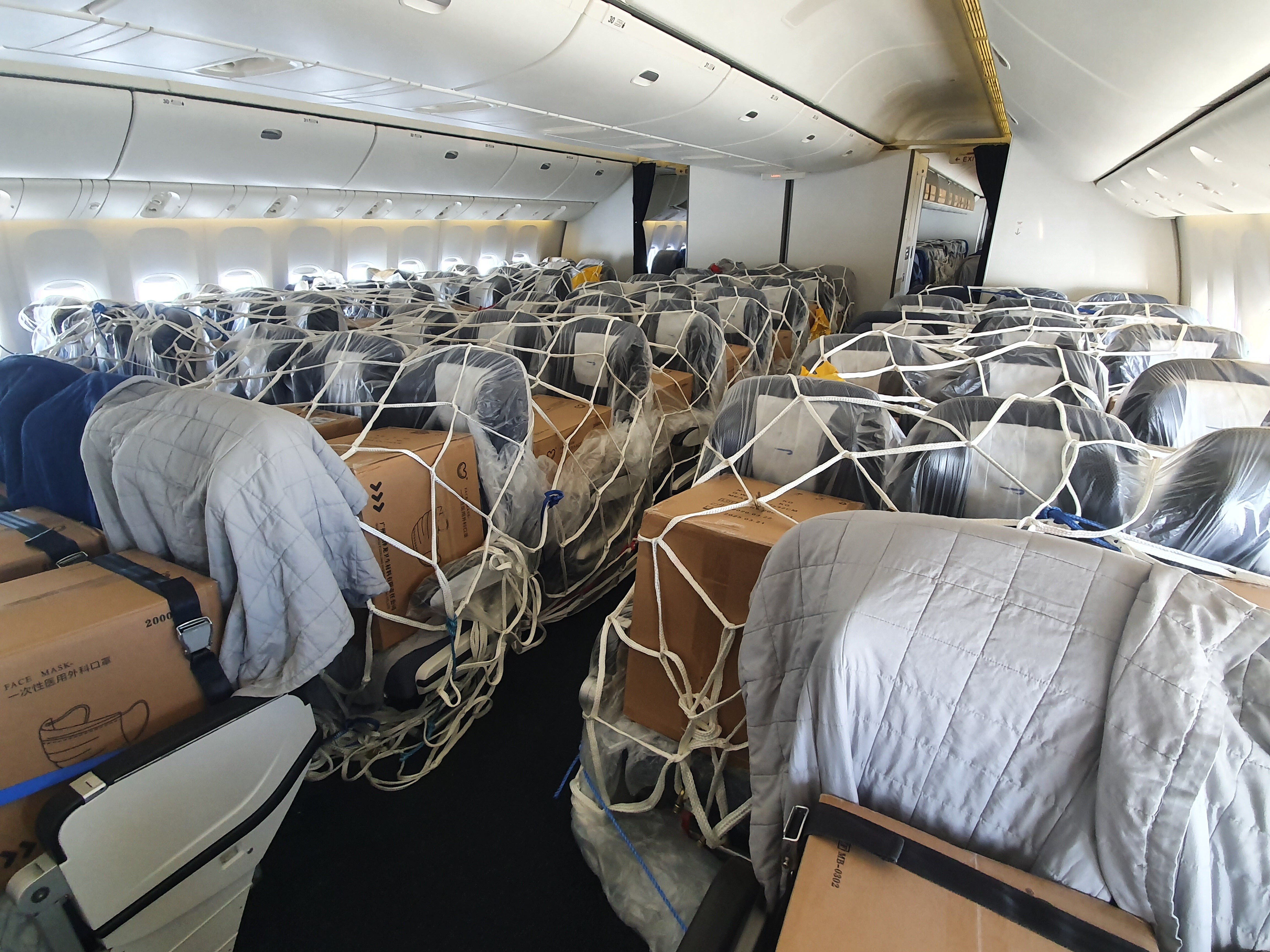 The airline is carrying cargo in the cabin as well as the hold for the first time (British Airways/PA)