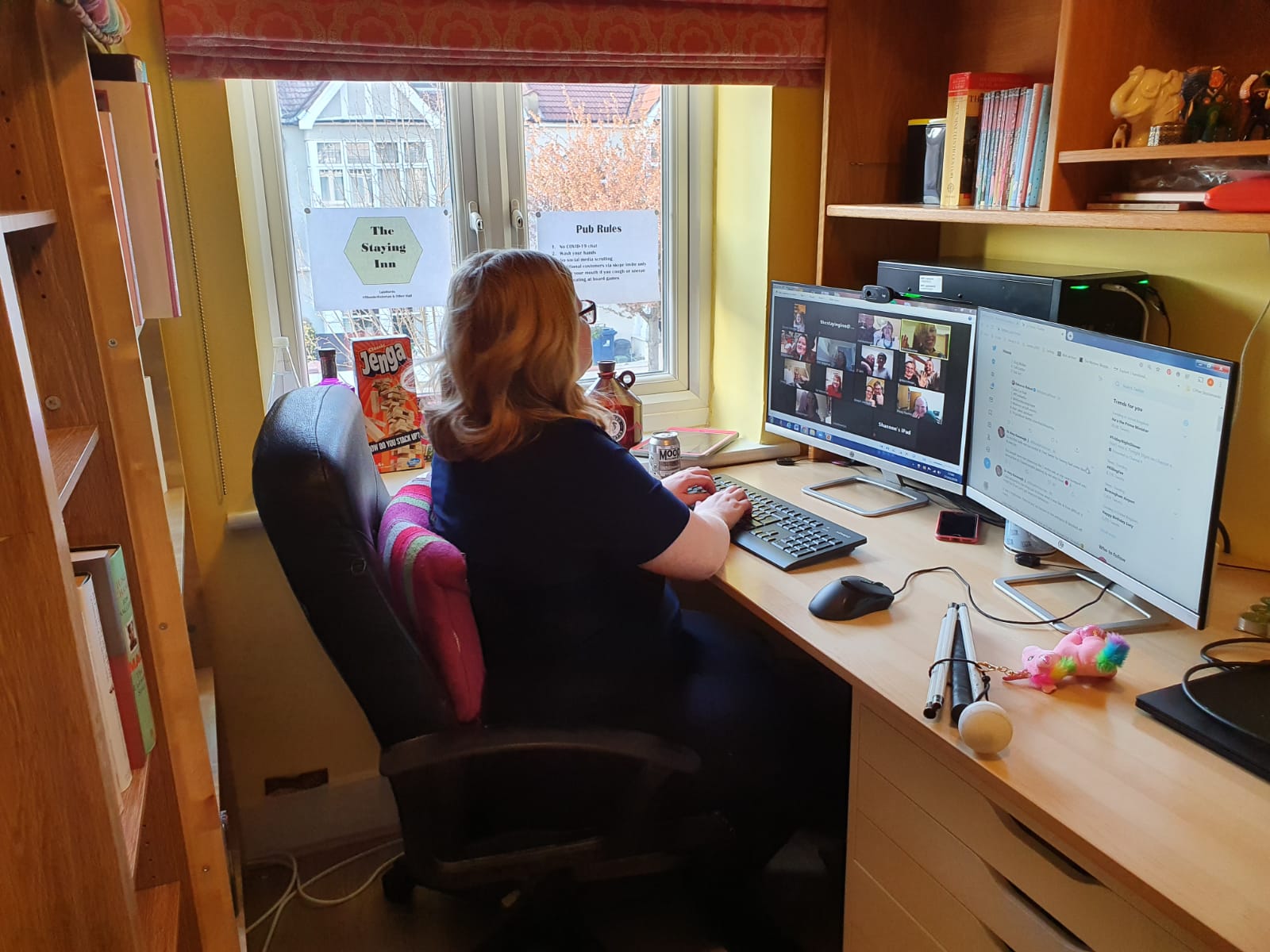 Dr Amy Kavanagh, a visually impaired activist, at her desk where she runs most of The Staying Inn's events