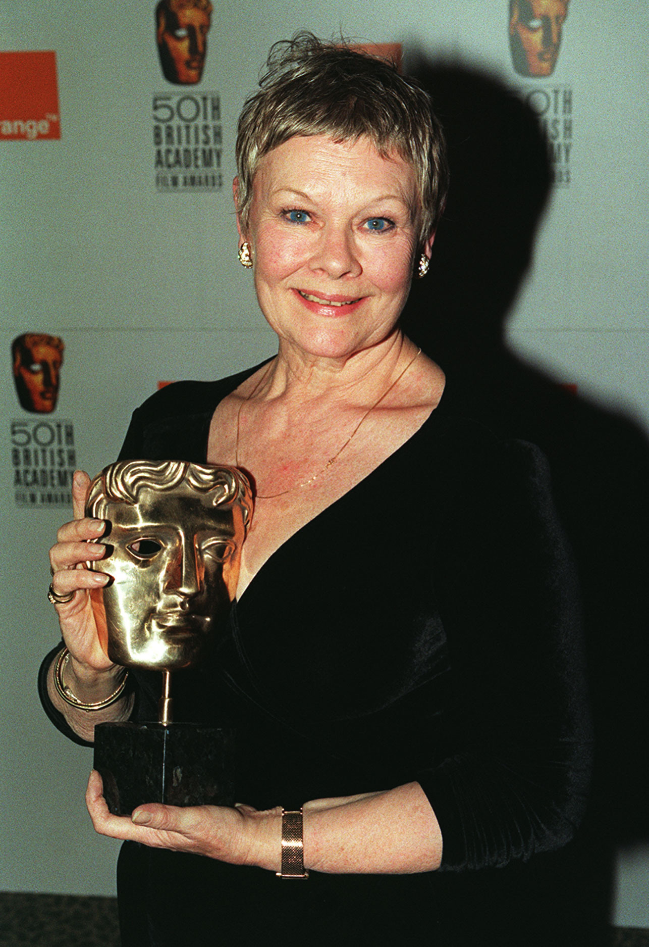Judi Dench winning the best actress award for Mrs Brown at the 1998 Baftas