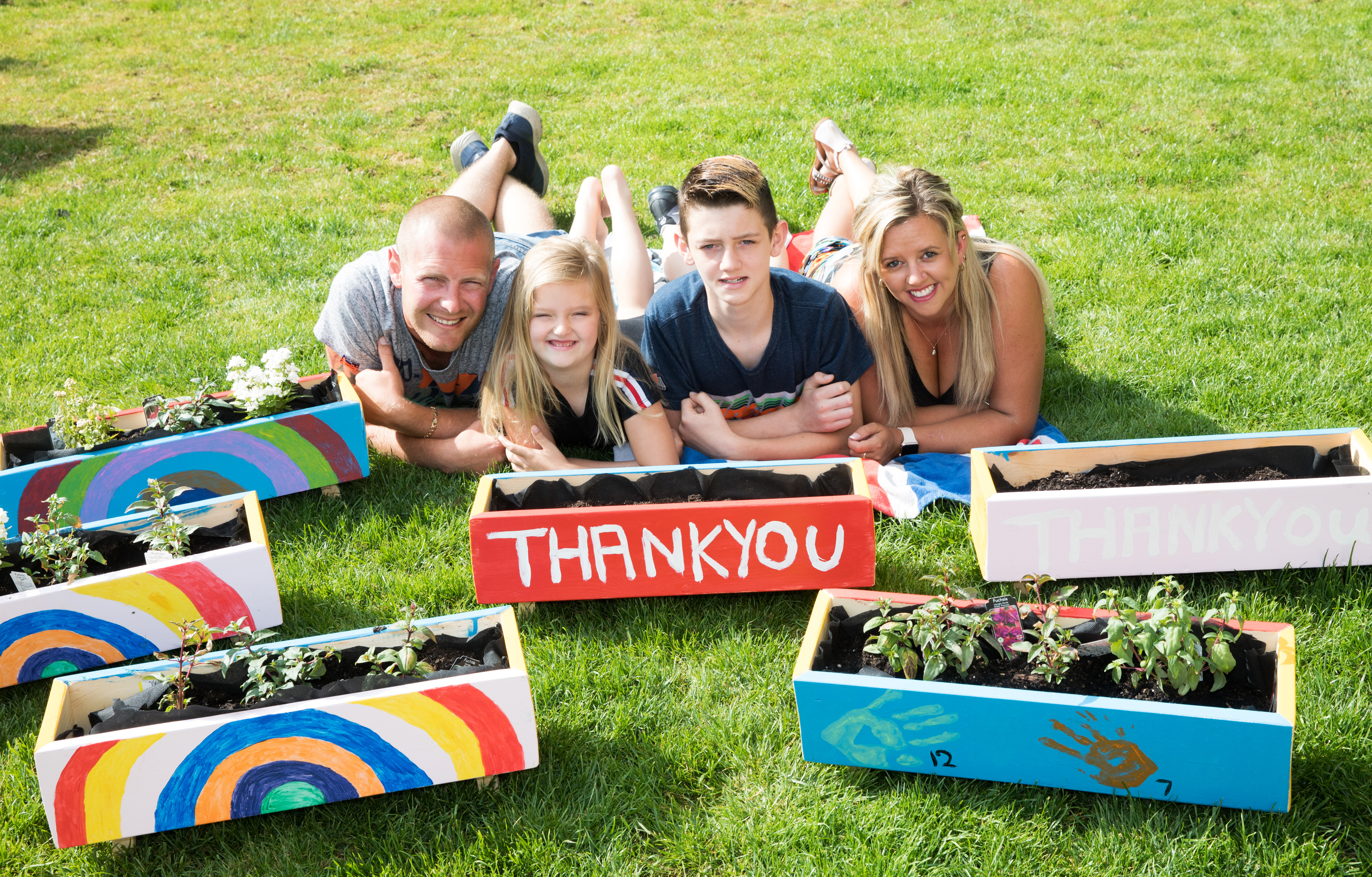 The Peart family with some of the planters