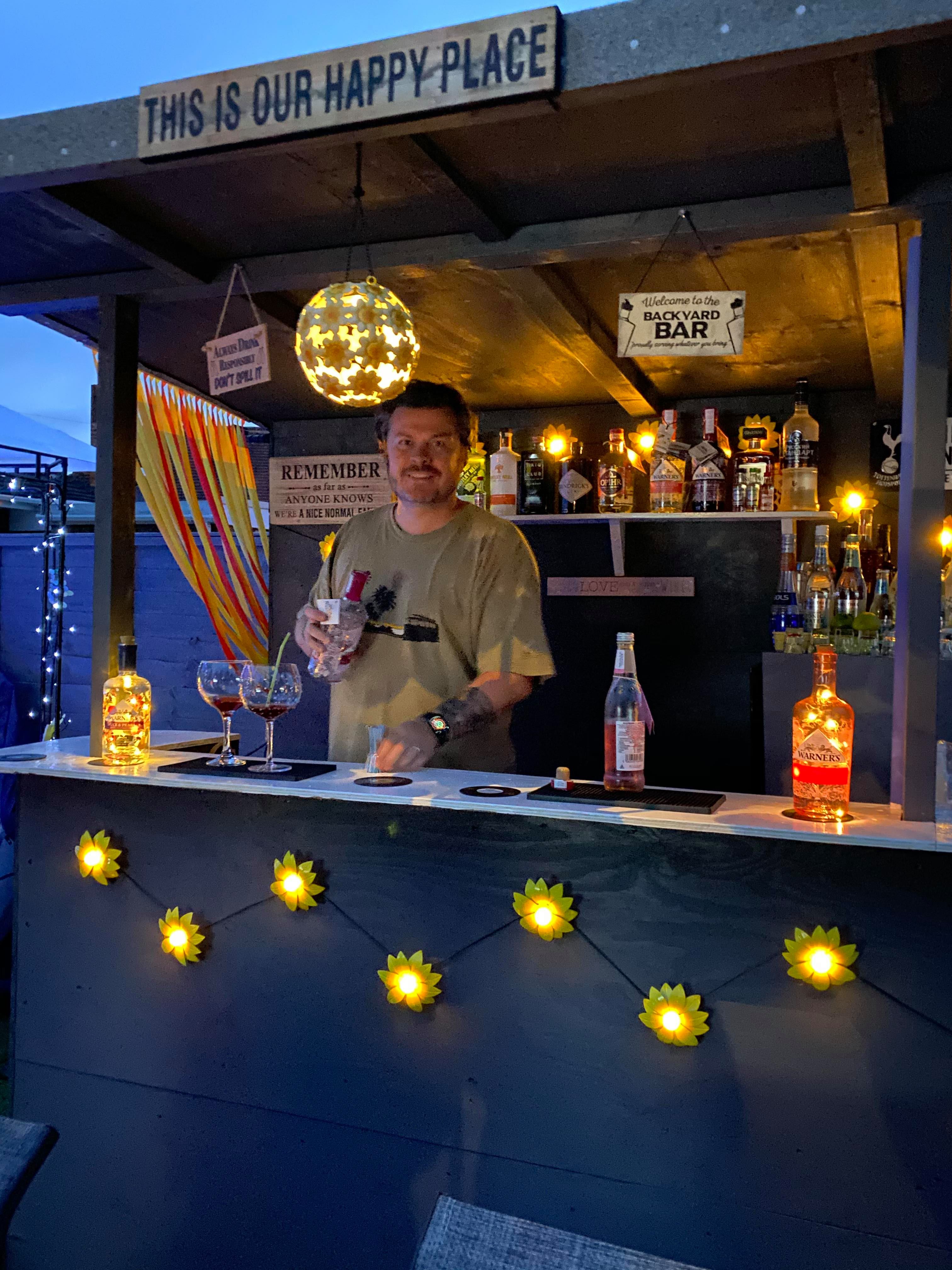 With the help of Mrs Rees' father, they have built a bar and recreated the festival's iconic pyramid stage