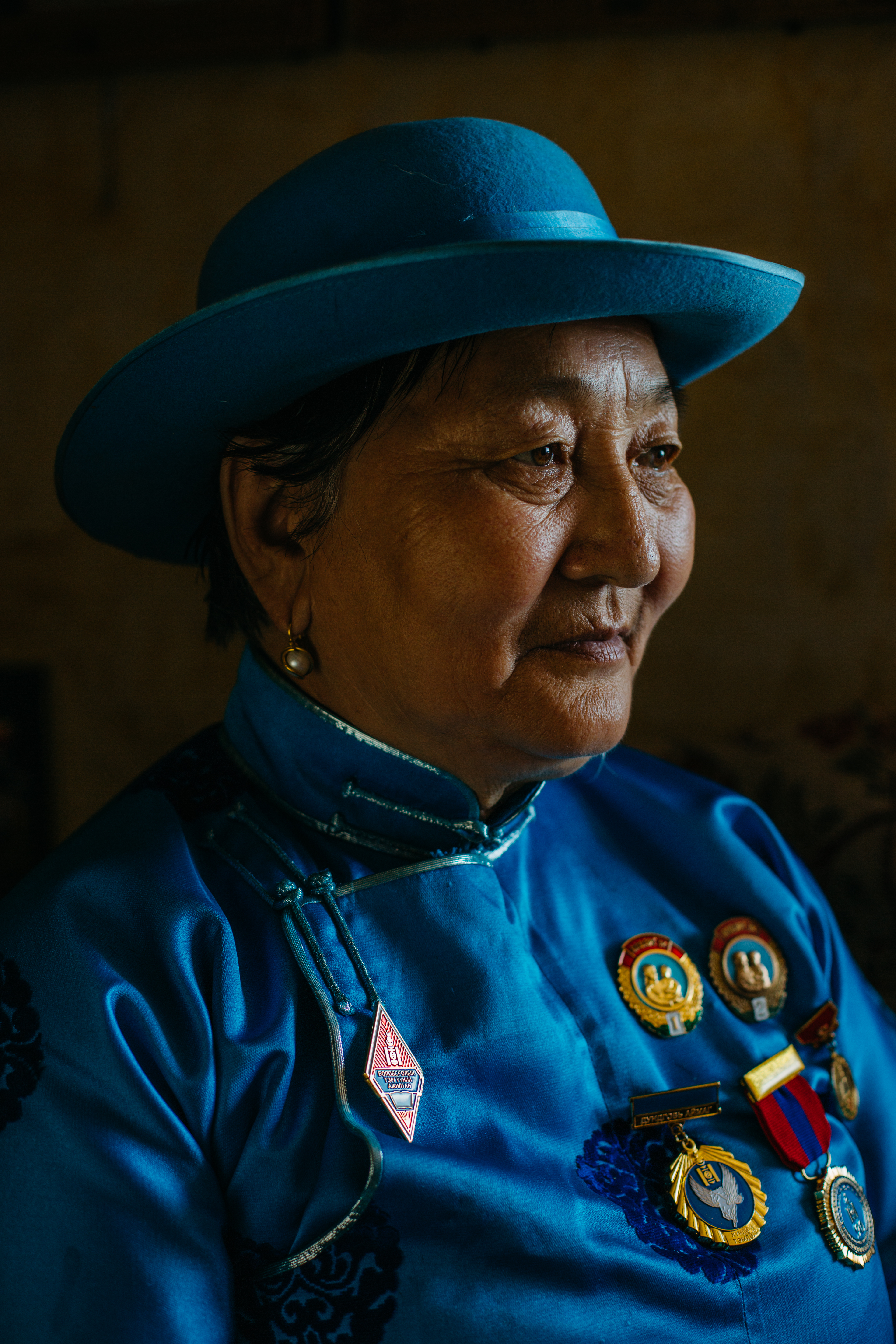 Dugerjav has 8 children and 22 grandchildren – in Mongolia, motherhood is seen as a patriotic duty and here she displays her Order of Glorious Motherhood medals