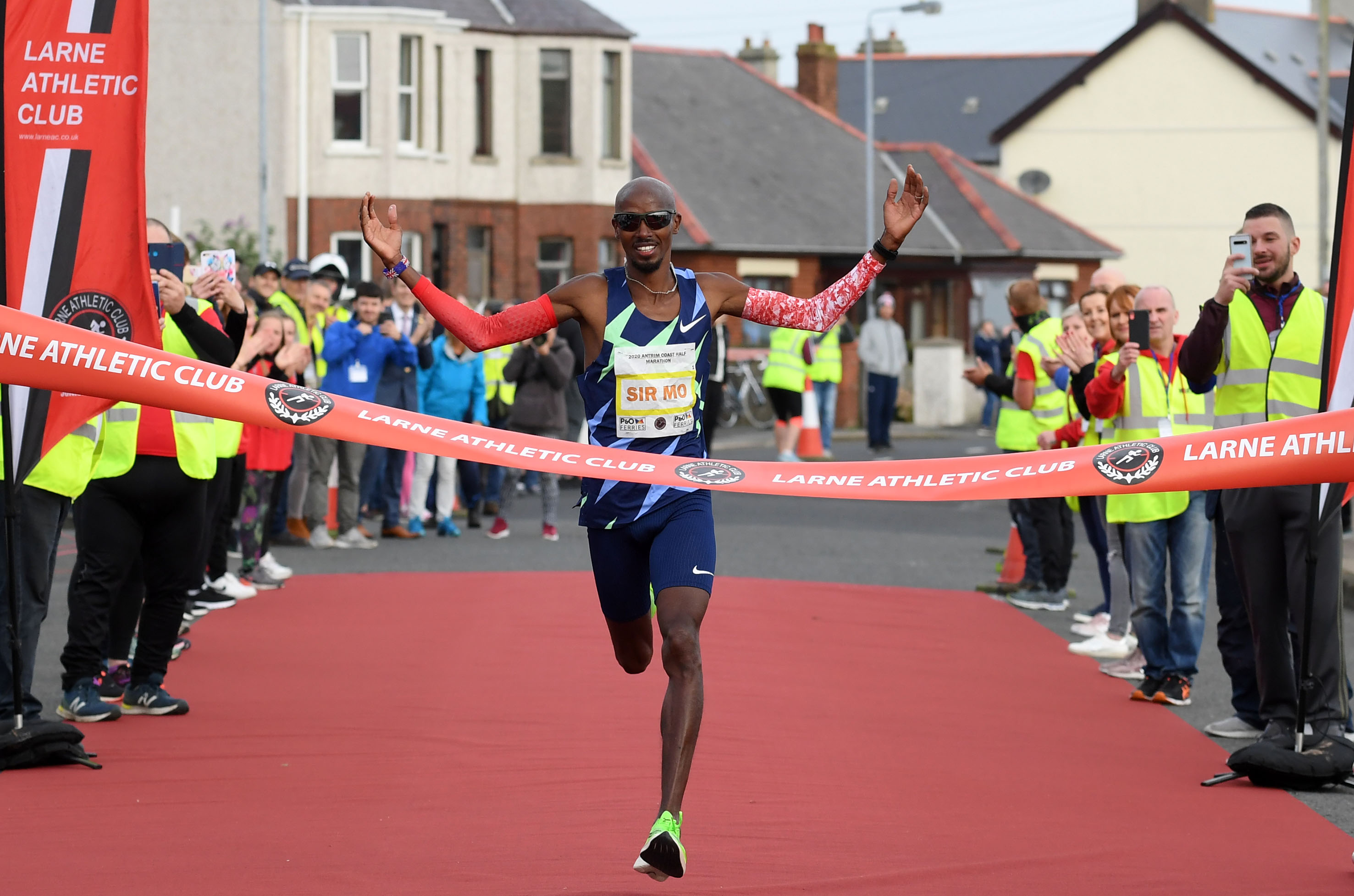 Sir Mo Farah celebrates victory