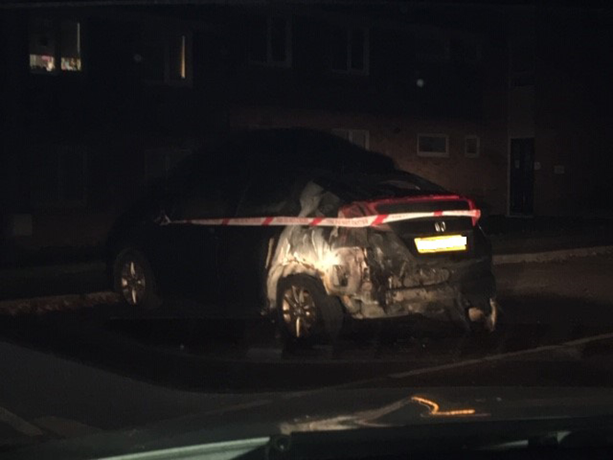 The black Honda Civic car was destroyed in the arson attack (Wiltshire Police/PA).