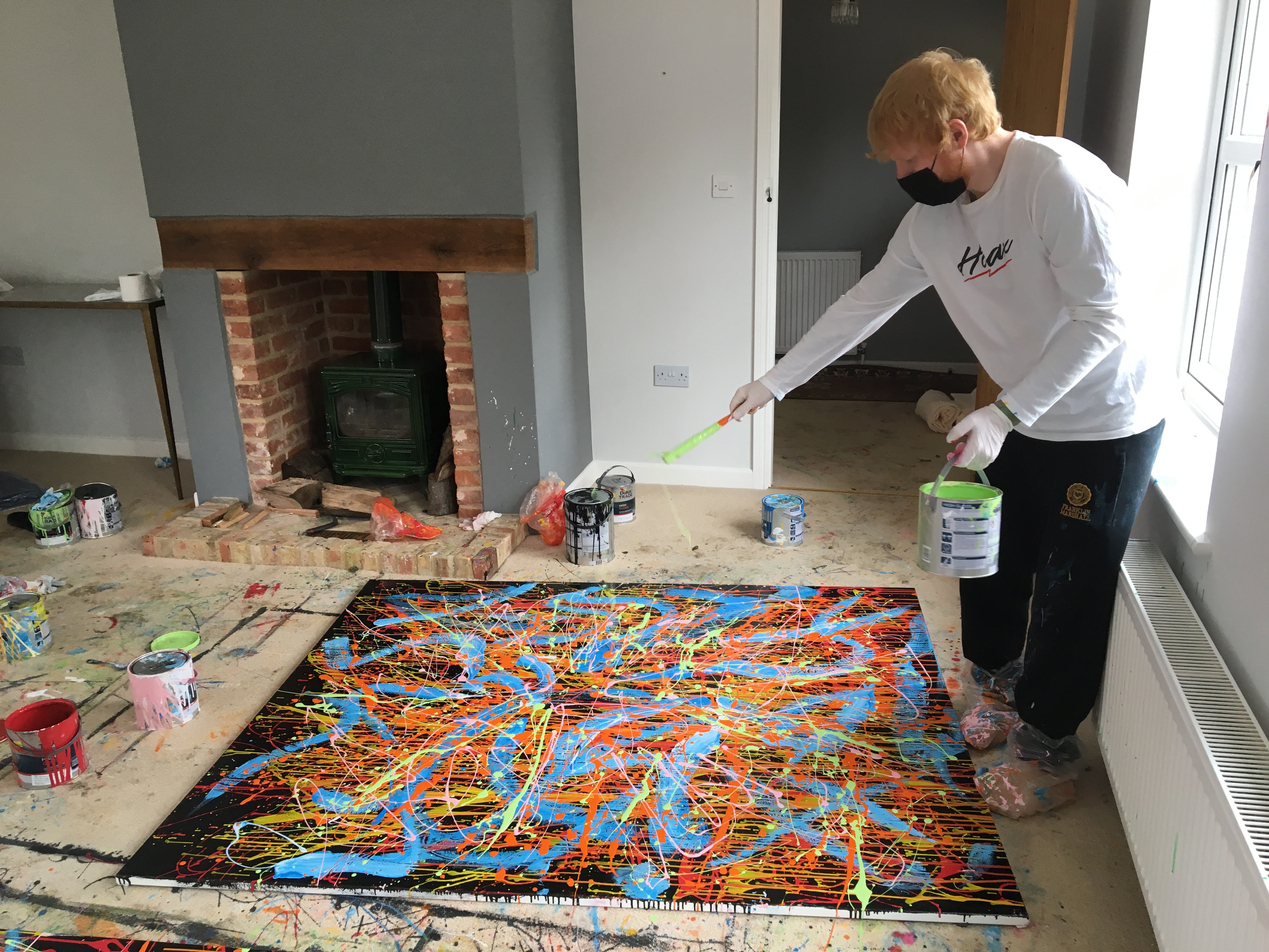 Ed Sheeran works on a separate painting. His artwork ‘Dab 2 2020’ is to be sold at a charity auction. (Ed Sheeran: Made In Suffolk Legacy Auction/ PA)