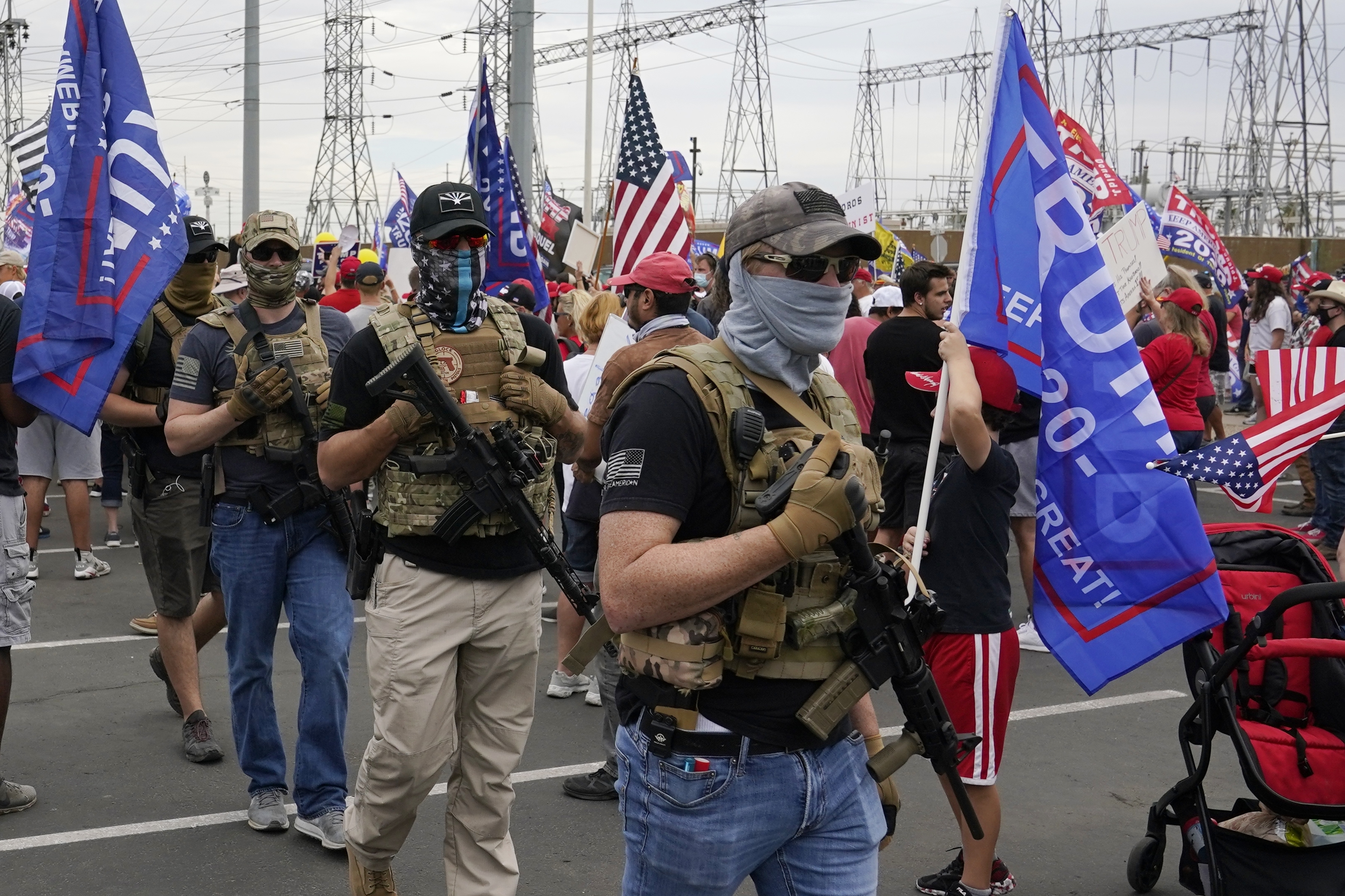 Gun carrying protesters continue to gather outside US vote counting