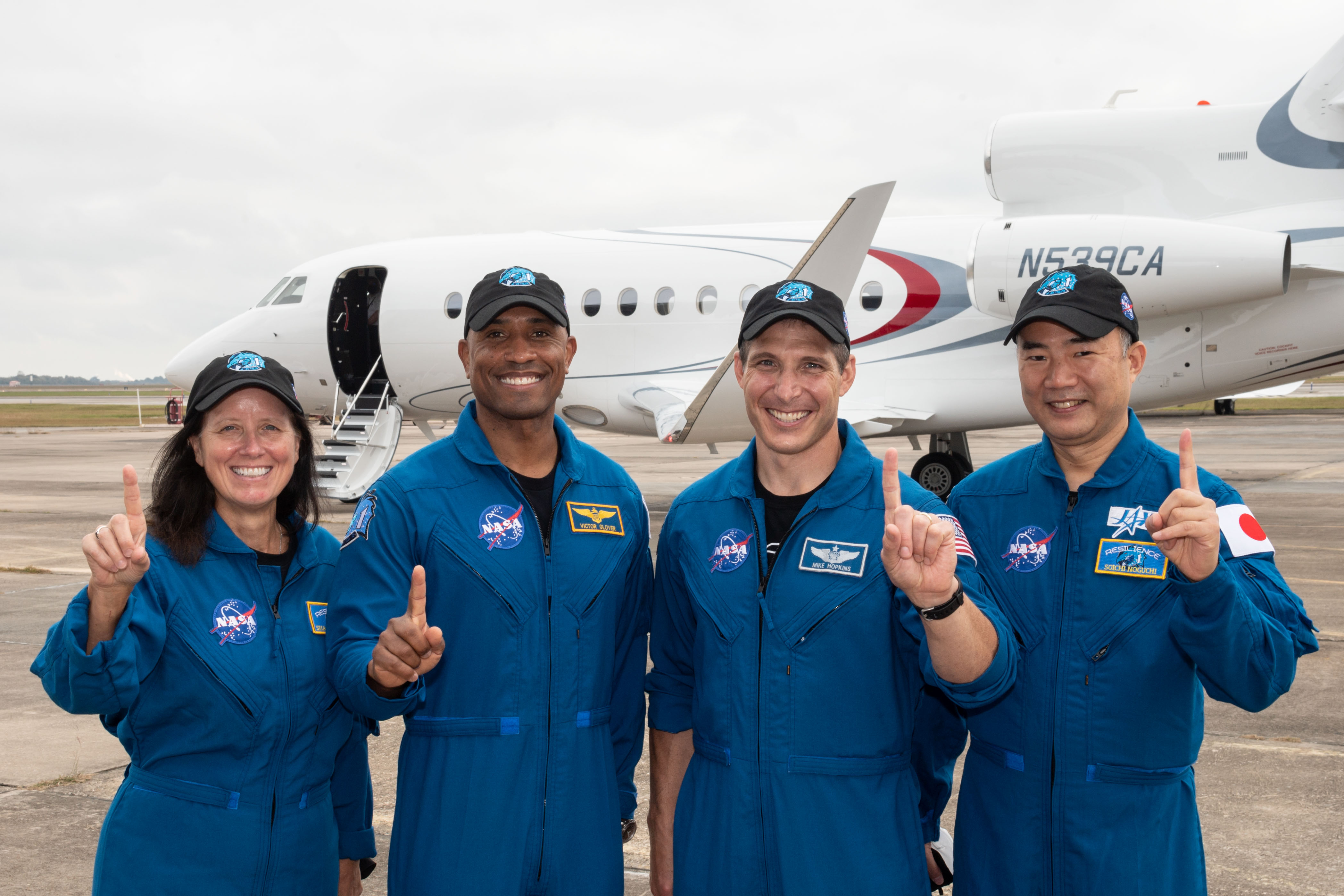 From left, crew 1 astronauts Shannon Walker, Victor Gover, Michael Hopkins and Soichi Noguchi at NASA's Johnson Space Center in Houston, Texas