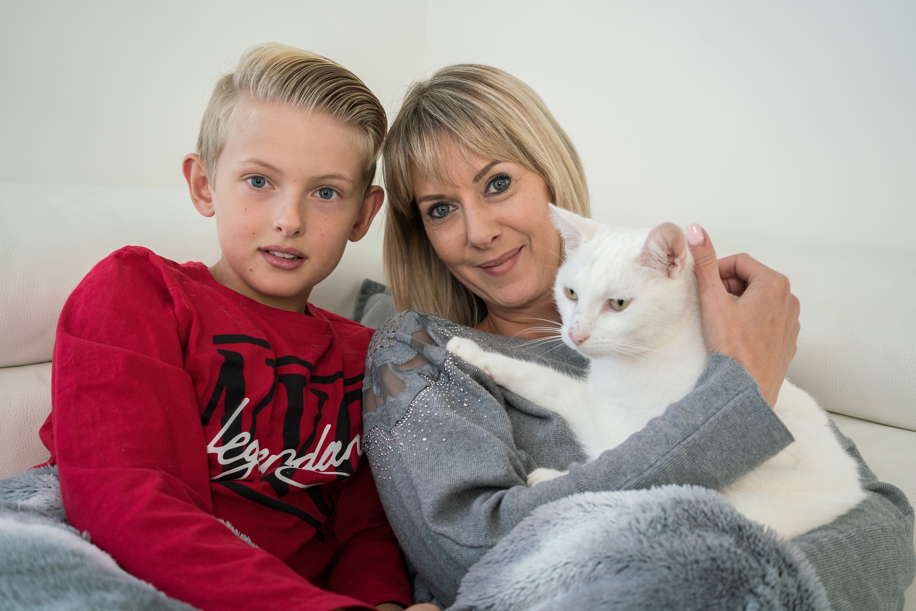 Daniel, 12, and his mum, Anna, with their cat, Casper.