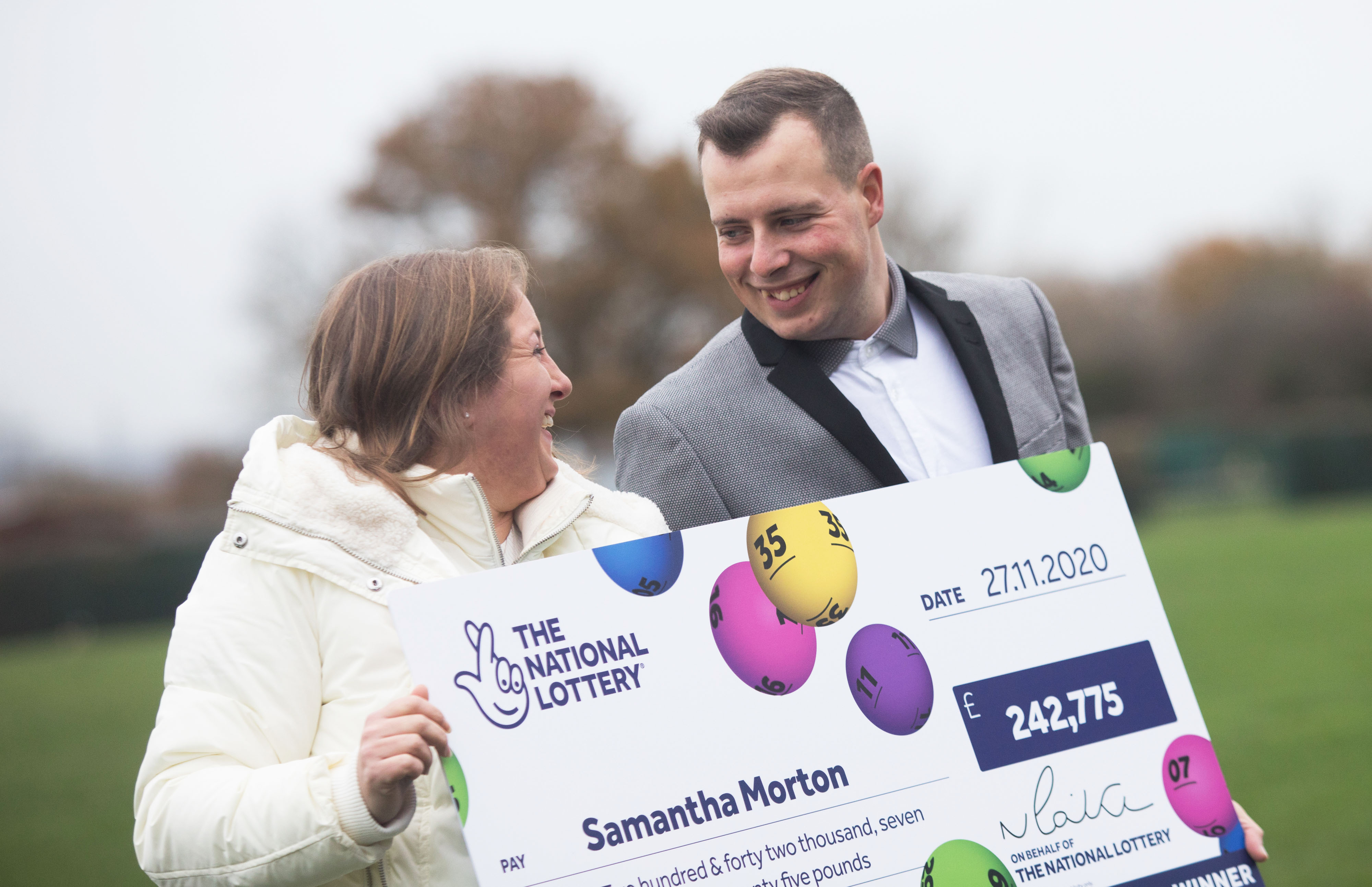 Samantha Morton, 36, who won £242,775.50 with a EuroMillions Lucky Dip ticket, celebrates with her boyfriend Barry Lingard, 26. (National Lottery/ PA)