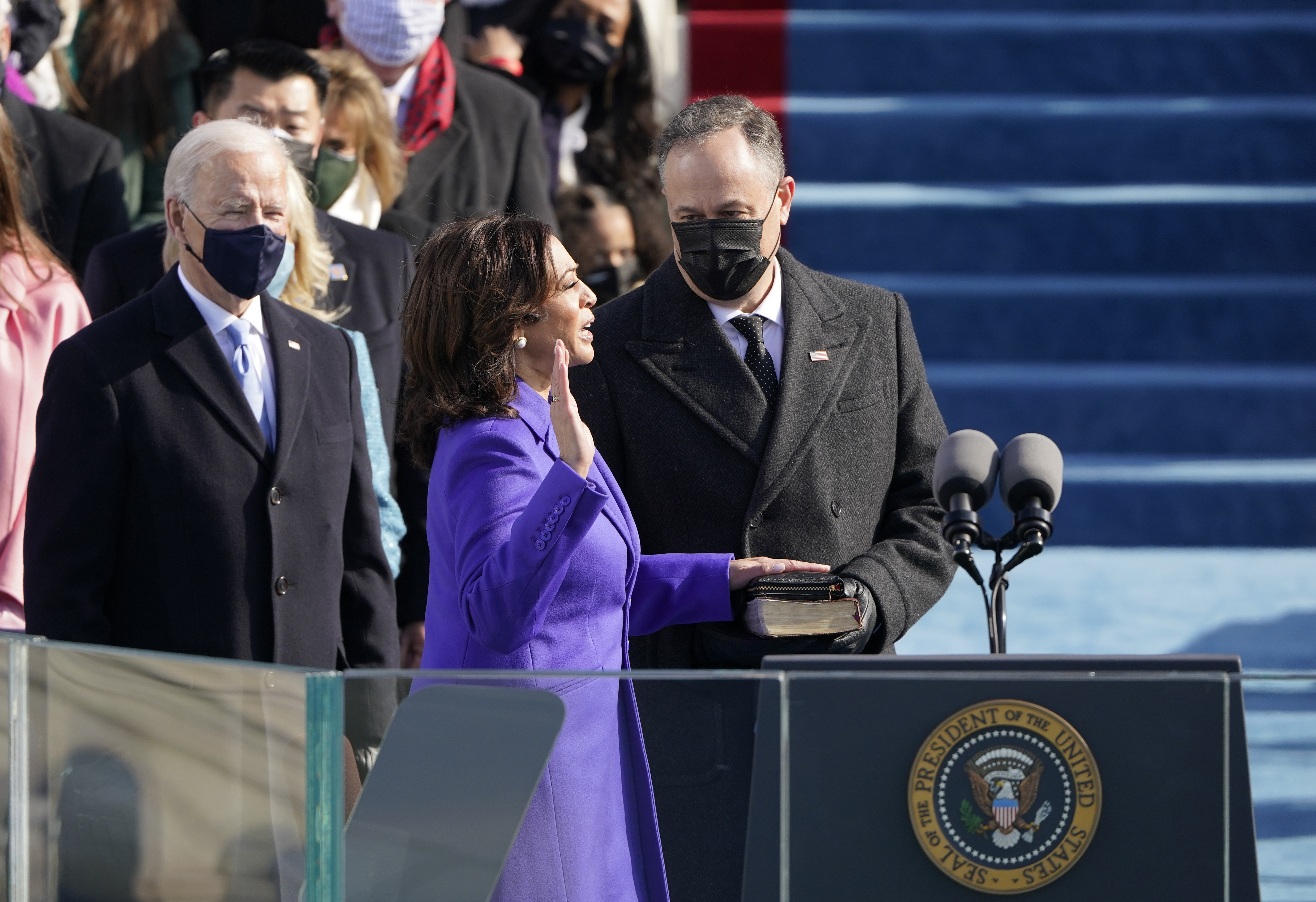 Kamala Harris is sworn in as vice president by Supreme Court Justice Sonia Sotomayor as her husband Doug Emhoff holds the Bible during the 59th presidential inauguration at the US Capitol in Washington