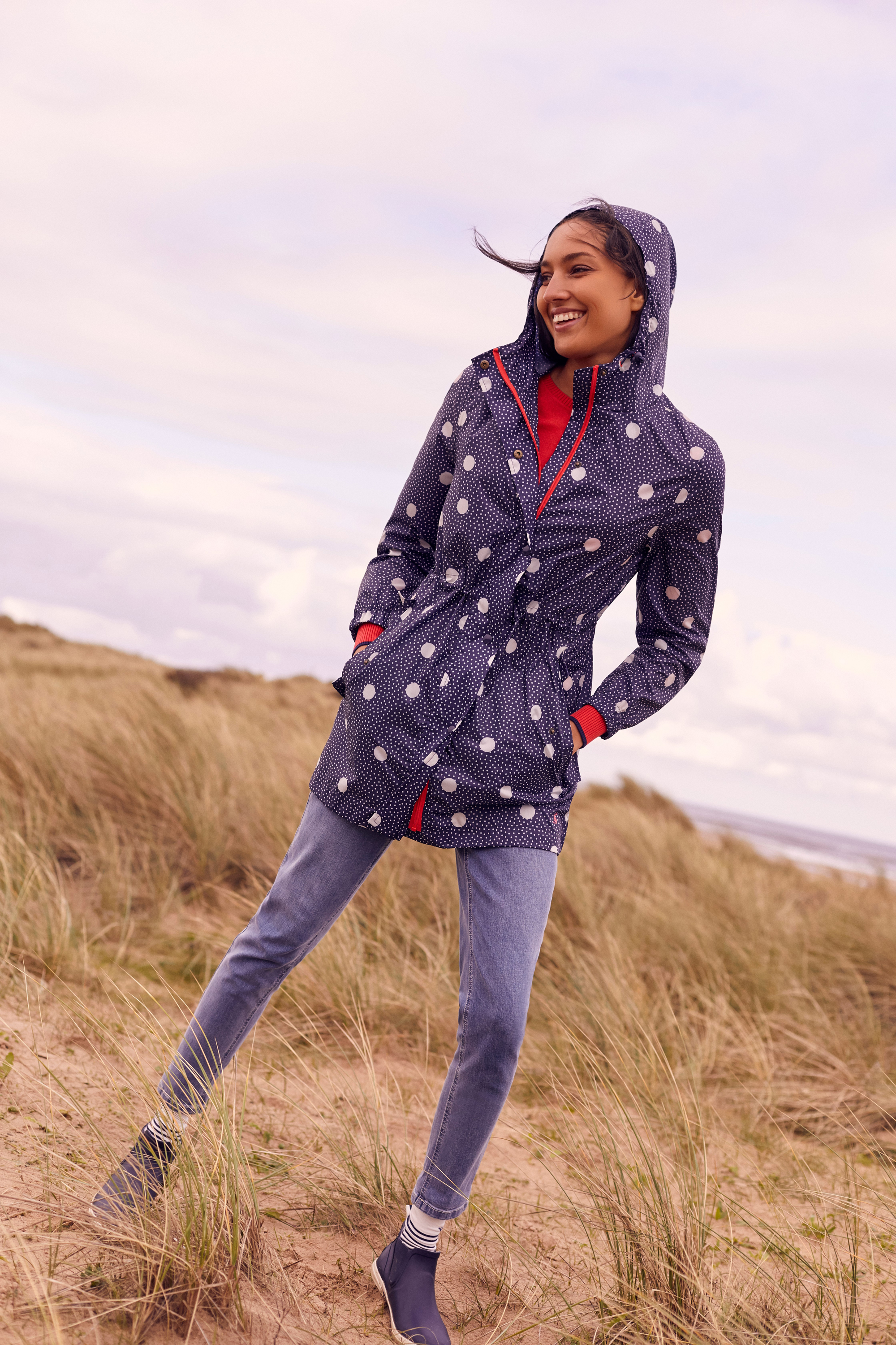 model wearing Joules Blue Rainwell Short Slip On Wellies