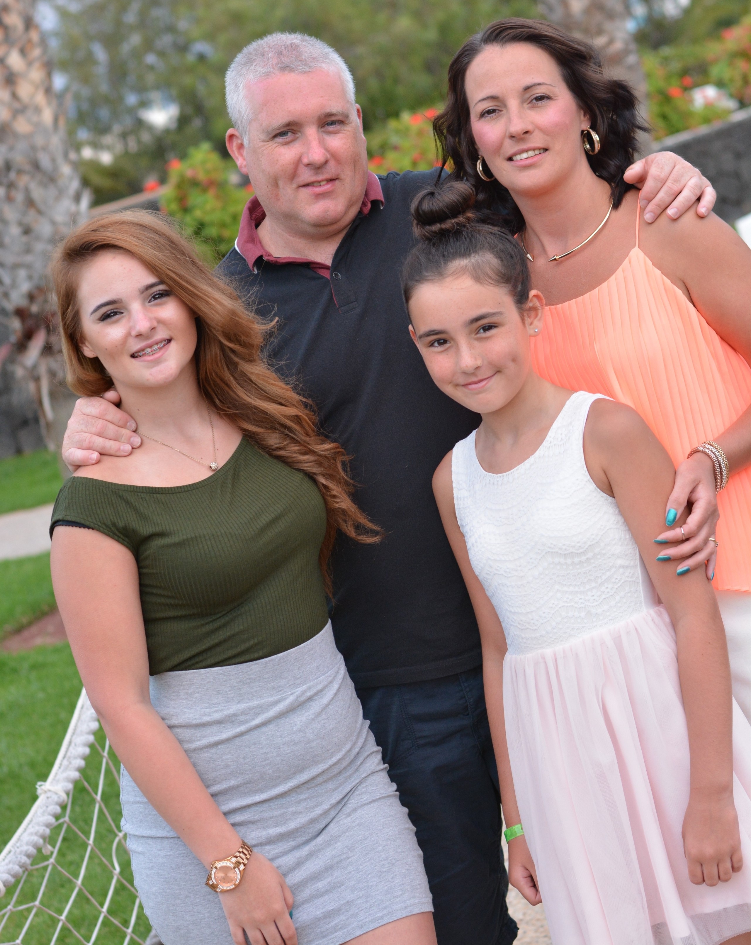 Brian Fernie with his partner and daughters (NHS Lanarkshire/PA)