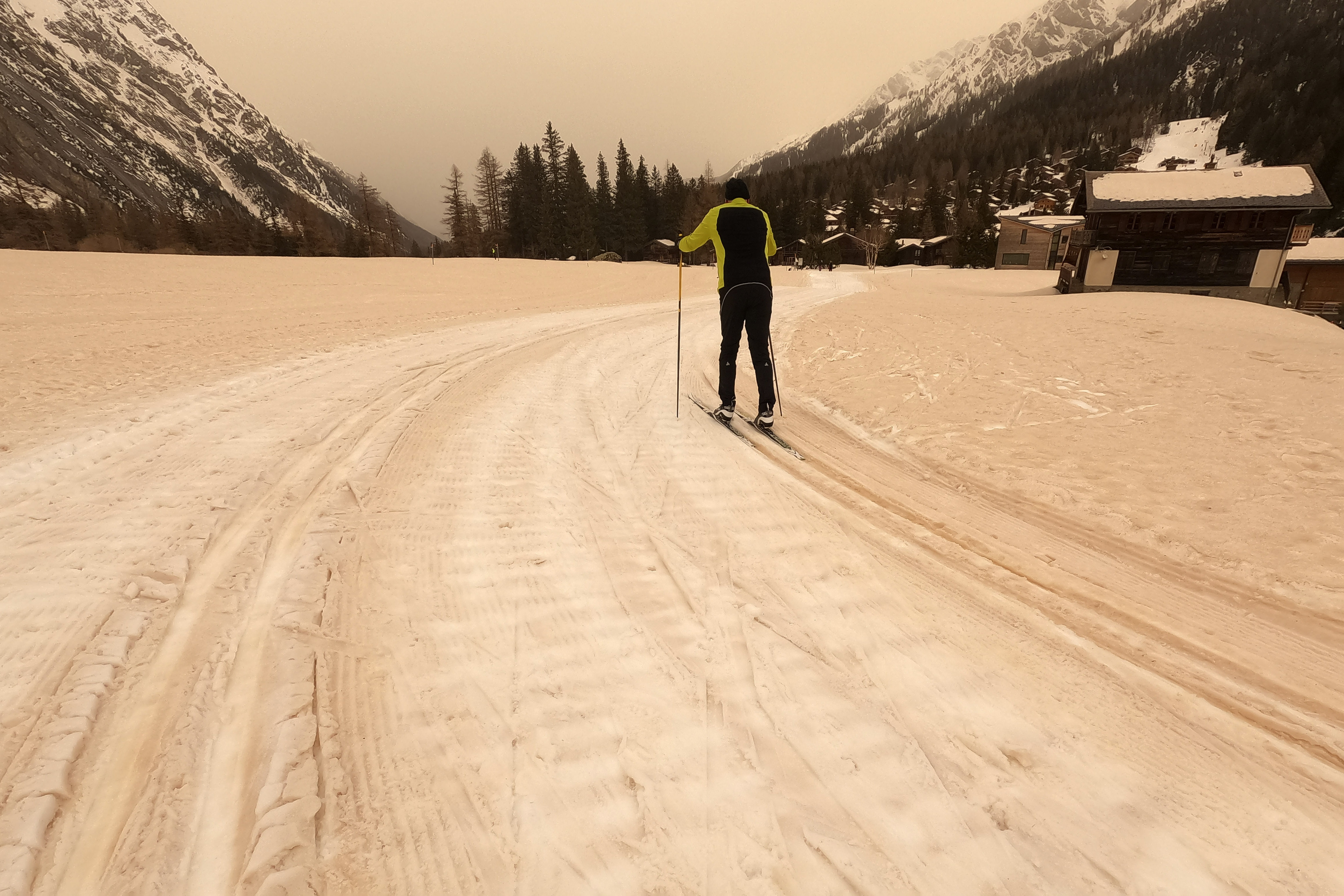 A cross-country ski track covered with sand at La Fouly in the Val Ferret, Switzerland 