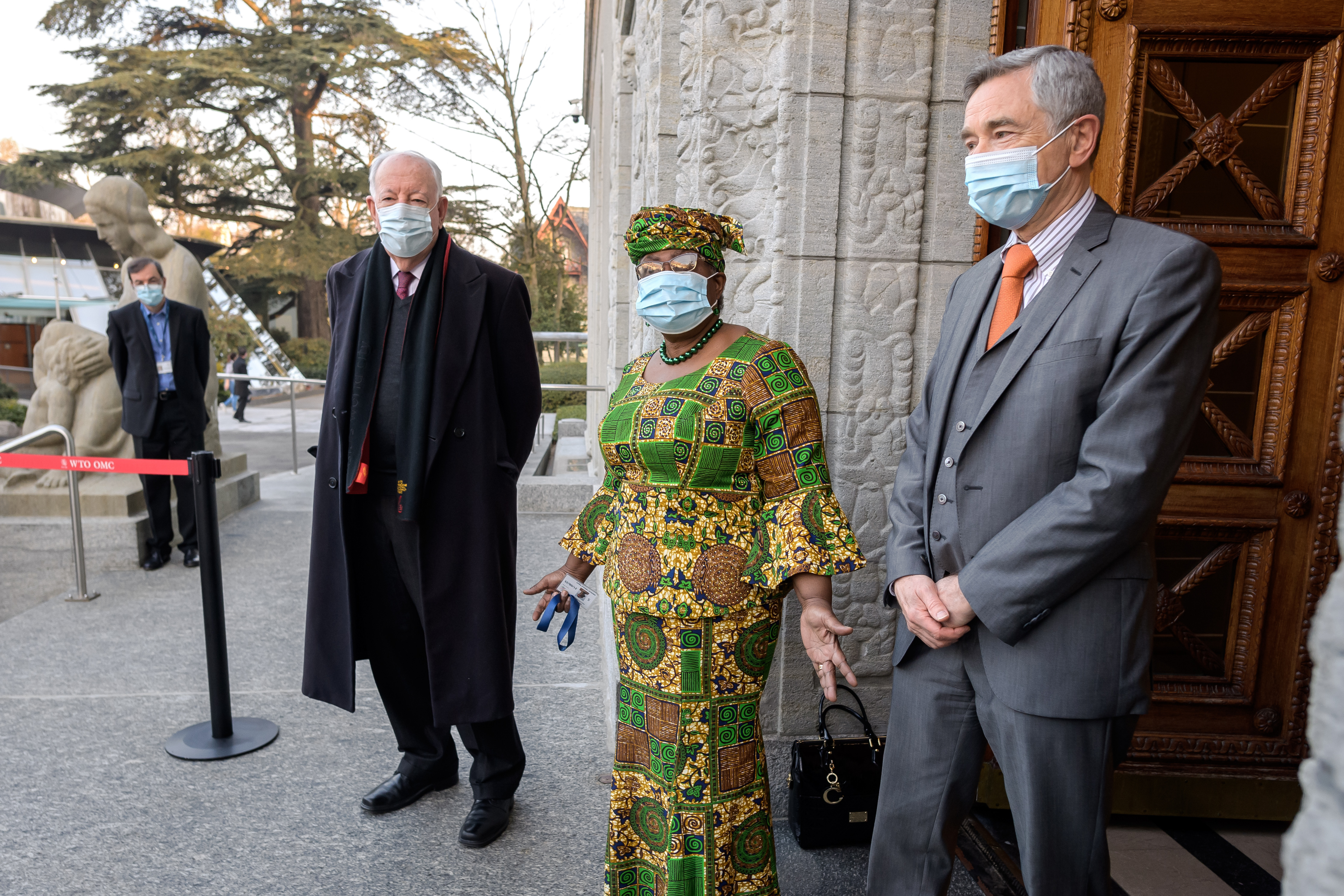 Ngozi Okonjo-Iweala, between WTO deputy directors-general Alan Wolff, left, and Karl Brauner