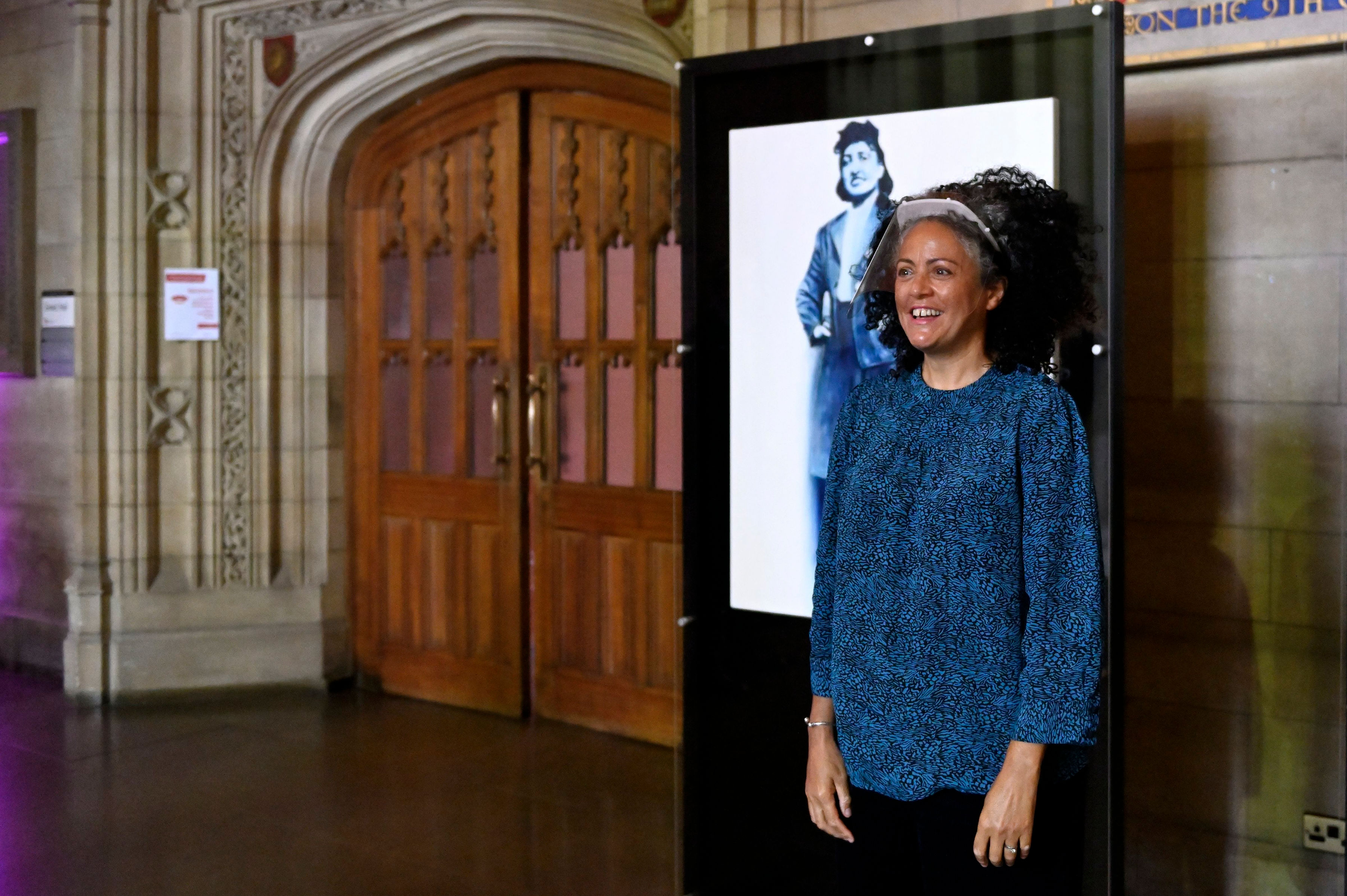 Artist Helen Wilson Roe at the unveiling of her portrait of Henrietta Lacks, which is currently on display at the University of Bristol (Bhagesh Sachania Photography/University of Bristol/PA).