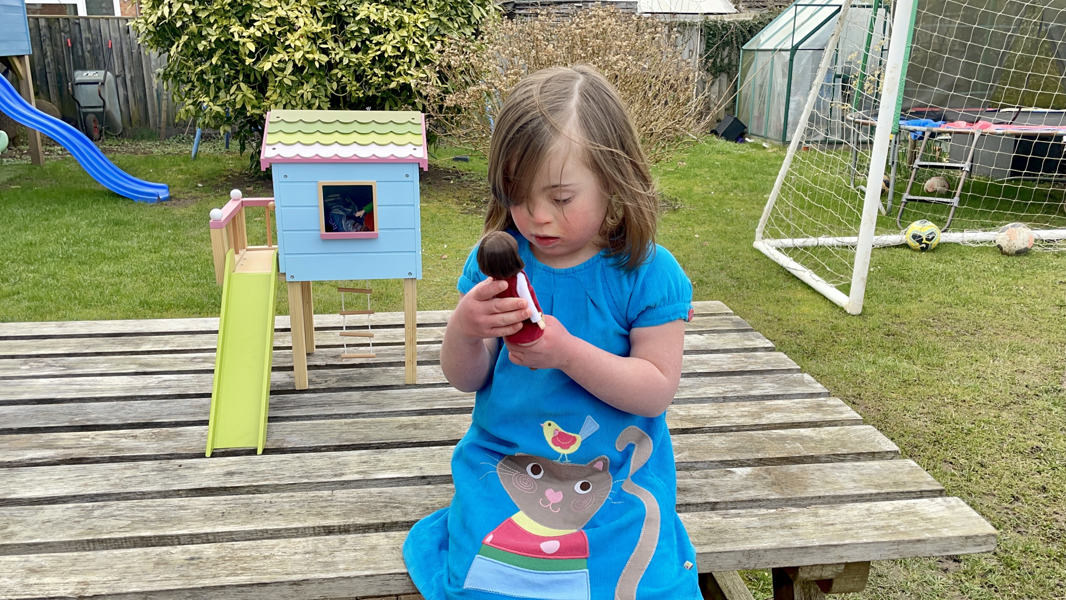 Rosie Barnett, 6, with a new Lottie Dolls toy