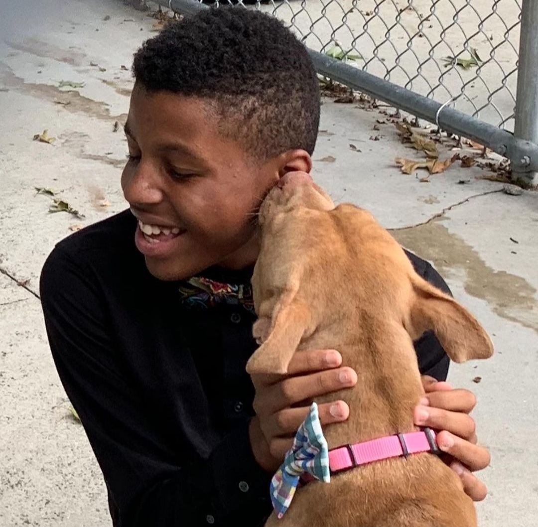 Darius Brown with a dog