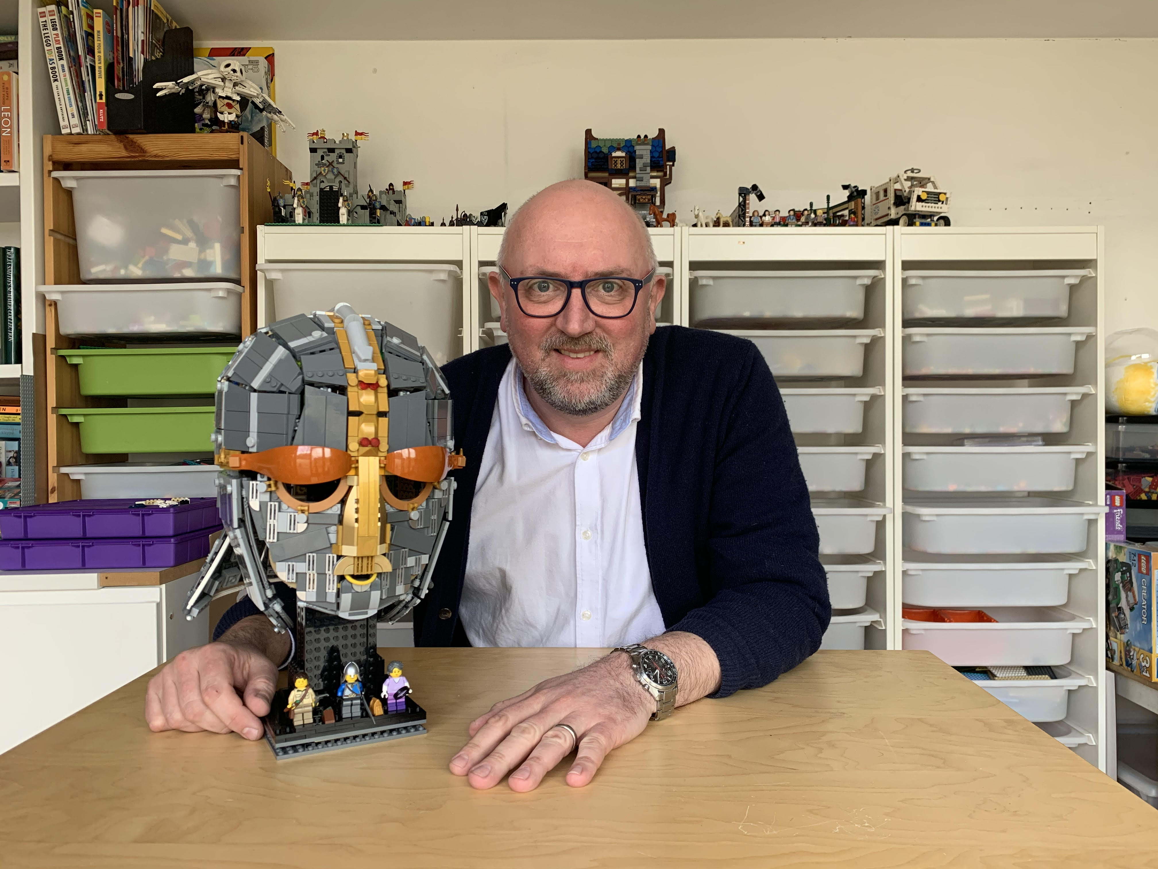 Andrew Webb, 45, with the Lego replica of the Sutton Hoo helmet. (Andrew Webb/ PA)