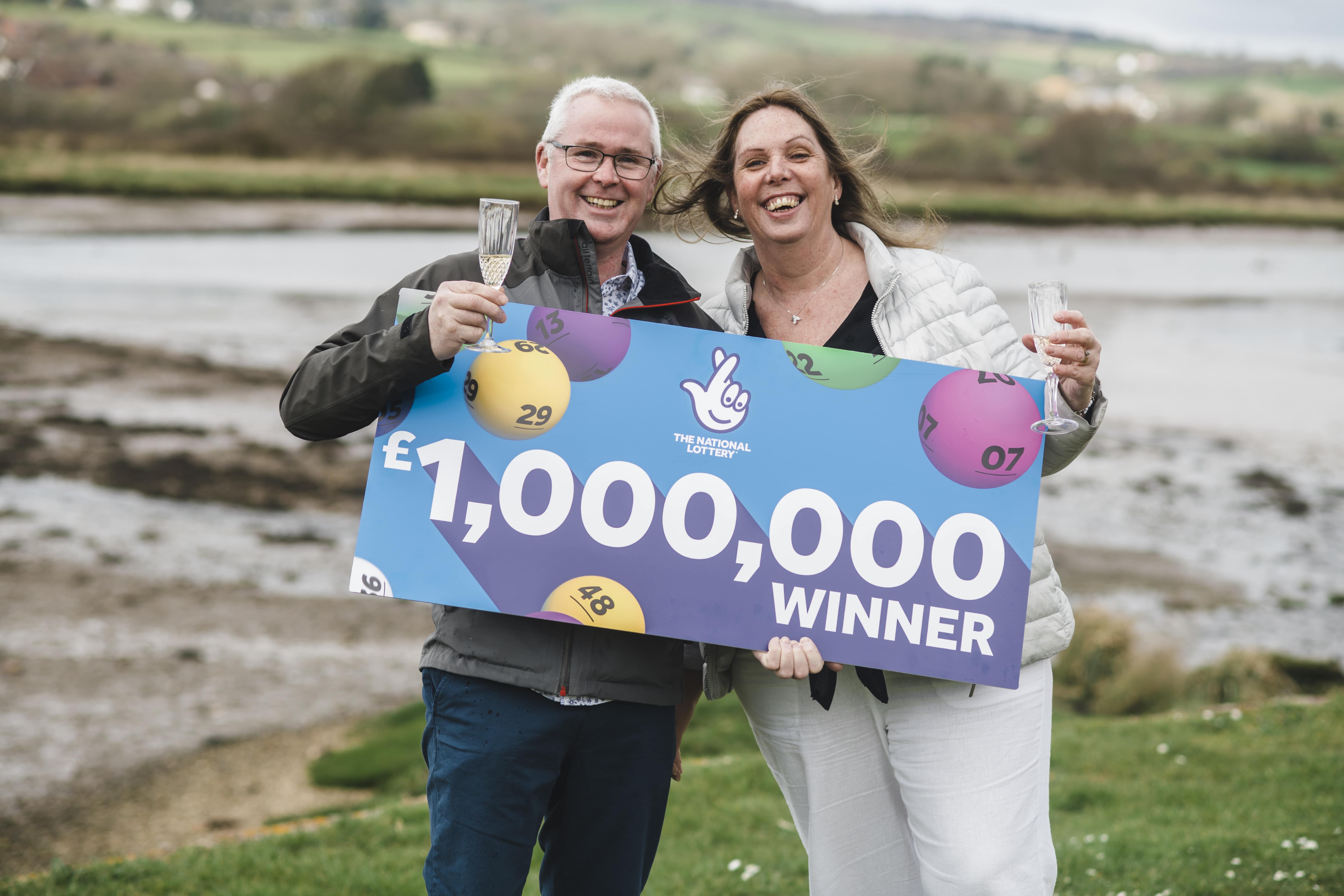 Neil and Sue Smart won £1 million on the EuroMillions and buy a new family home (National Lottery/PA)