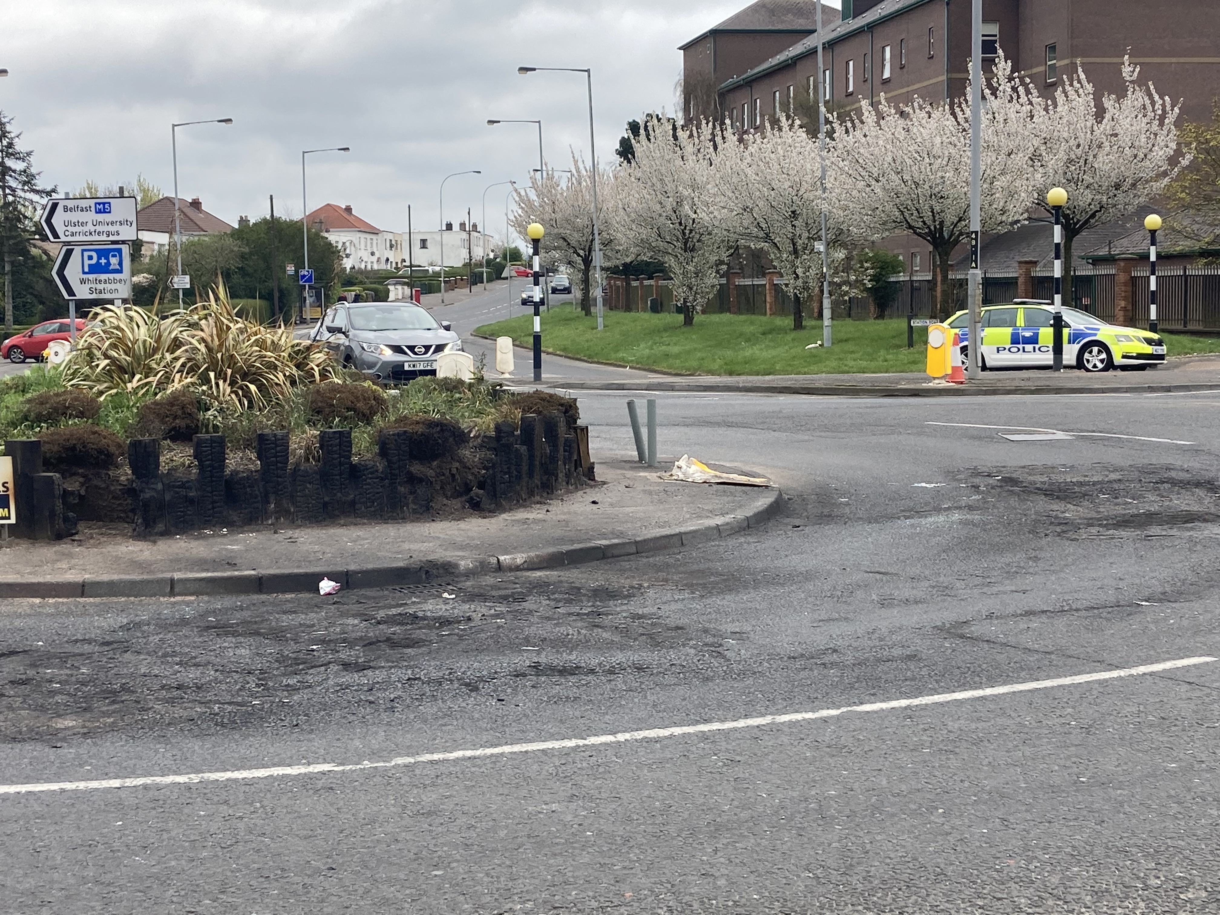 The scene in Newtownabbey, Co Antrim where police came under attack with 30 petrol bombs on Saturday