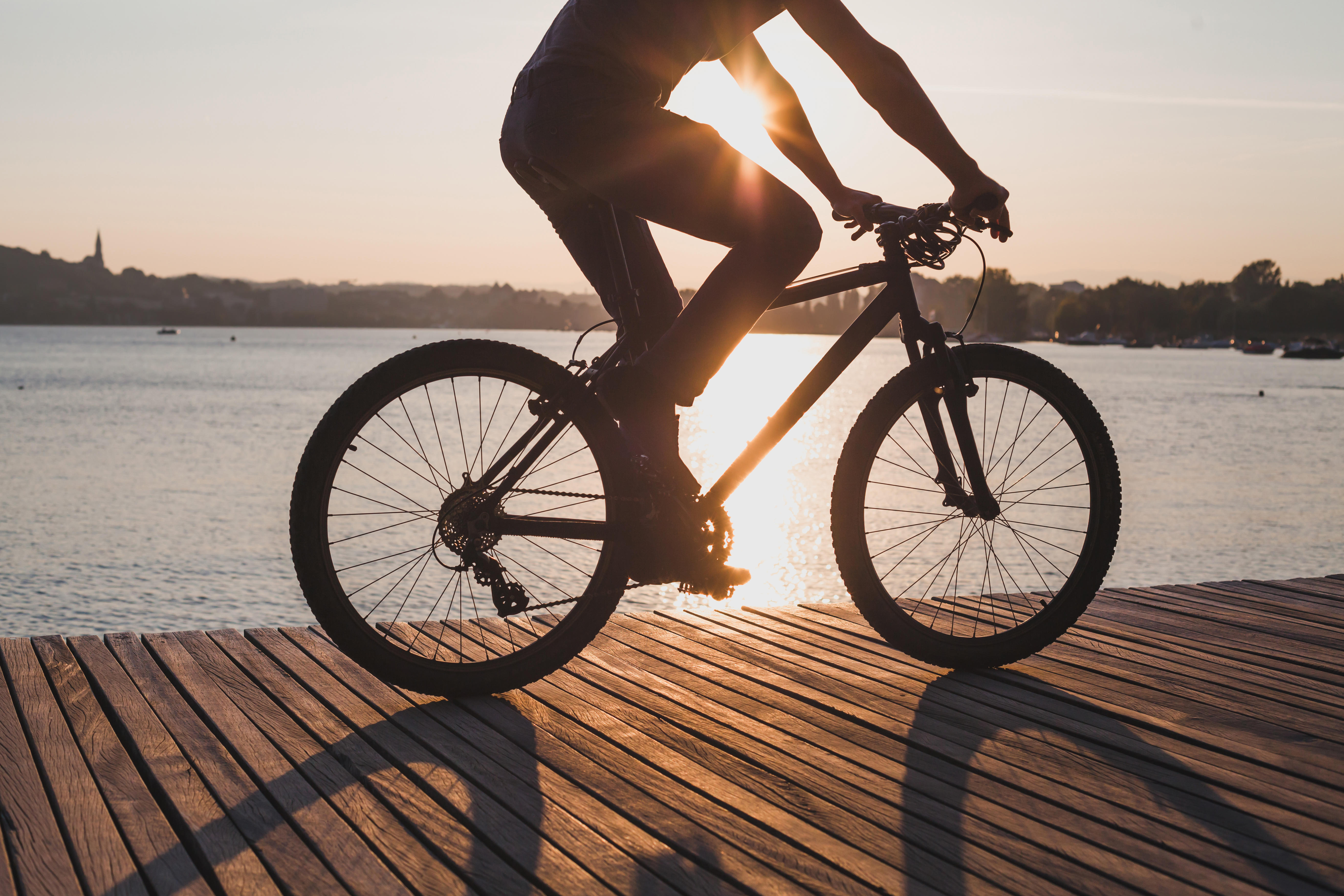 Tips For Exercising If You’re Fasting During Ramadan 5 man riding bicycle at sunset