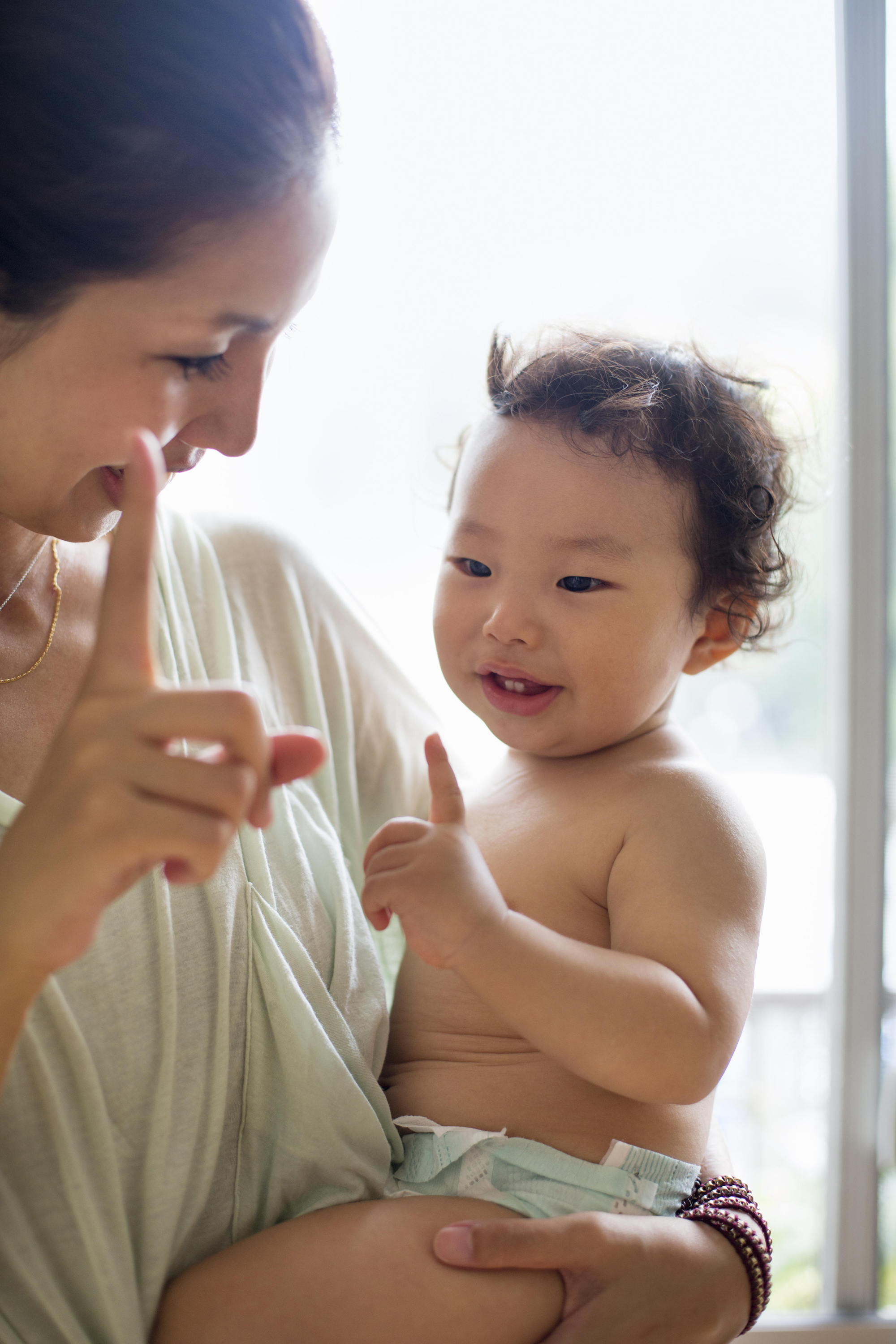 woman talking to baby