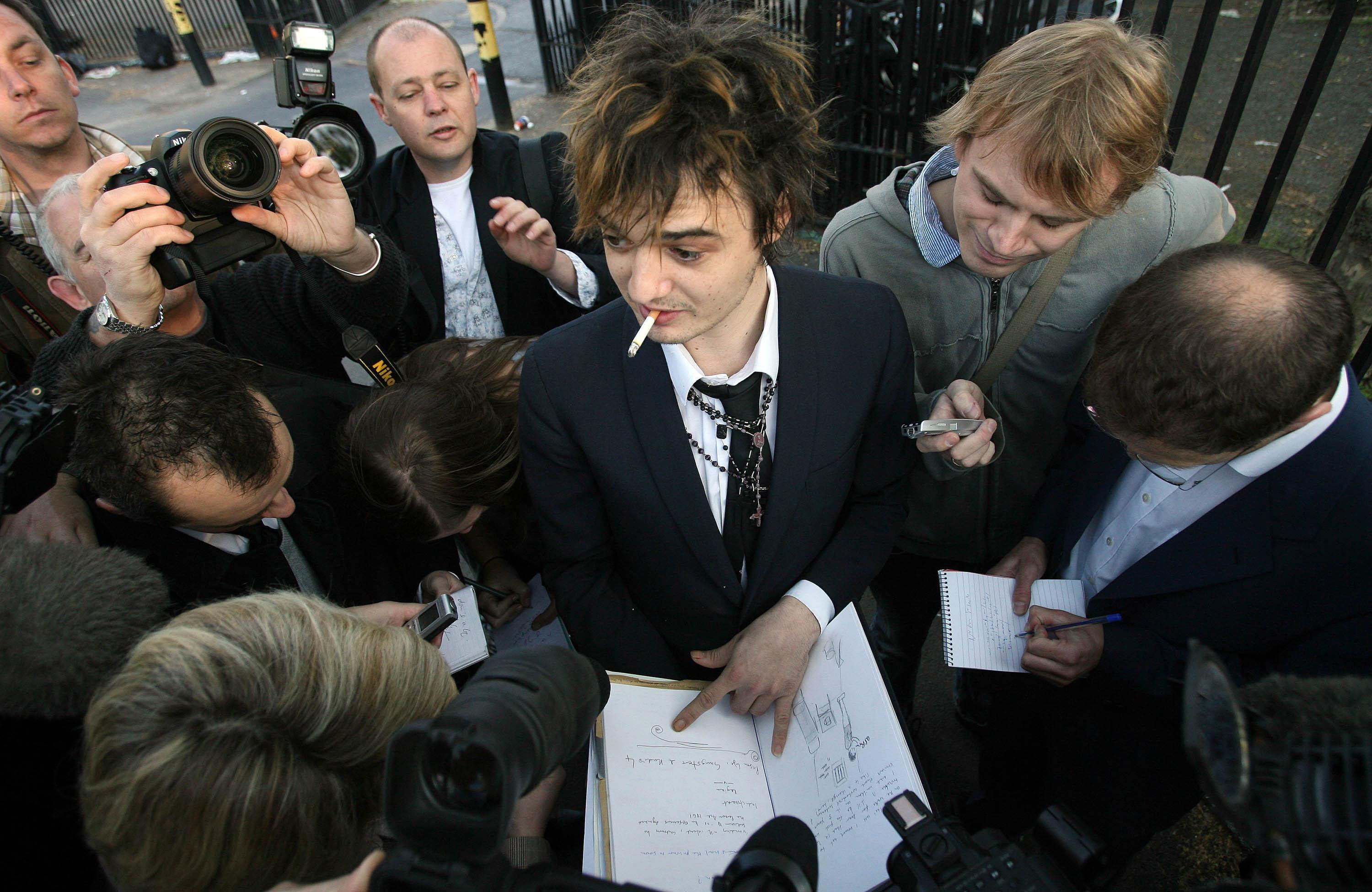 Pete Doherty outside Wormwood Scrubs upon his release from prison in 2008 (Lewis Whyld/PA)