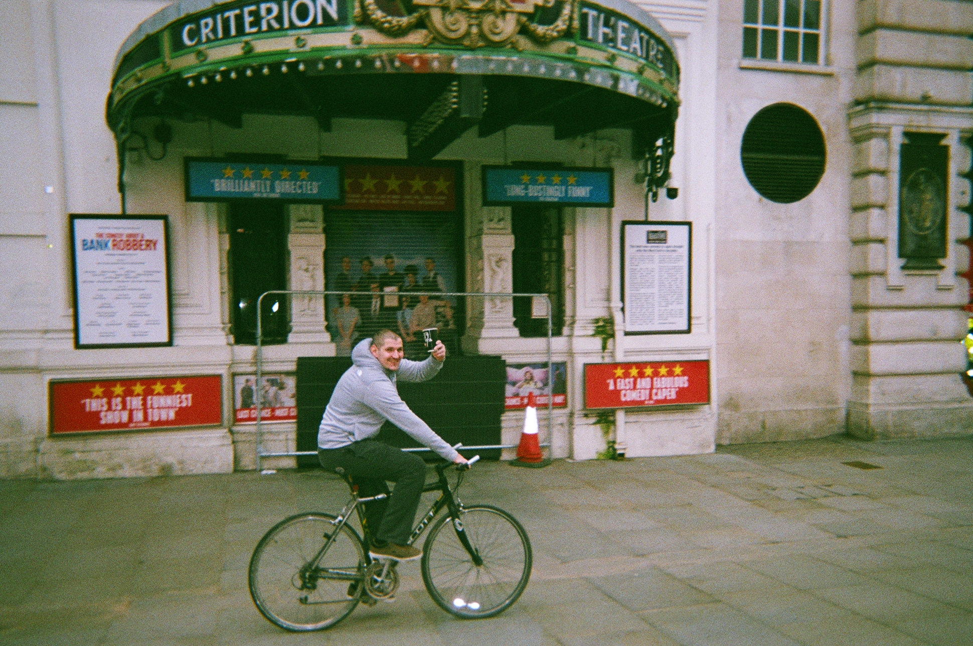 A man stood next to a bin, taken by Darren Fairbrass