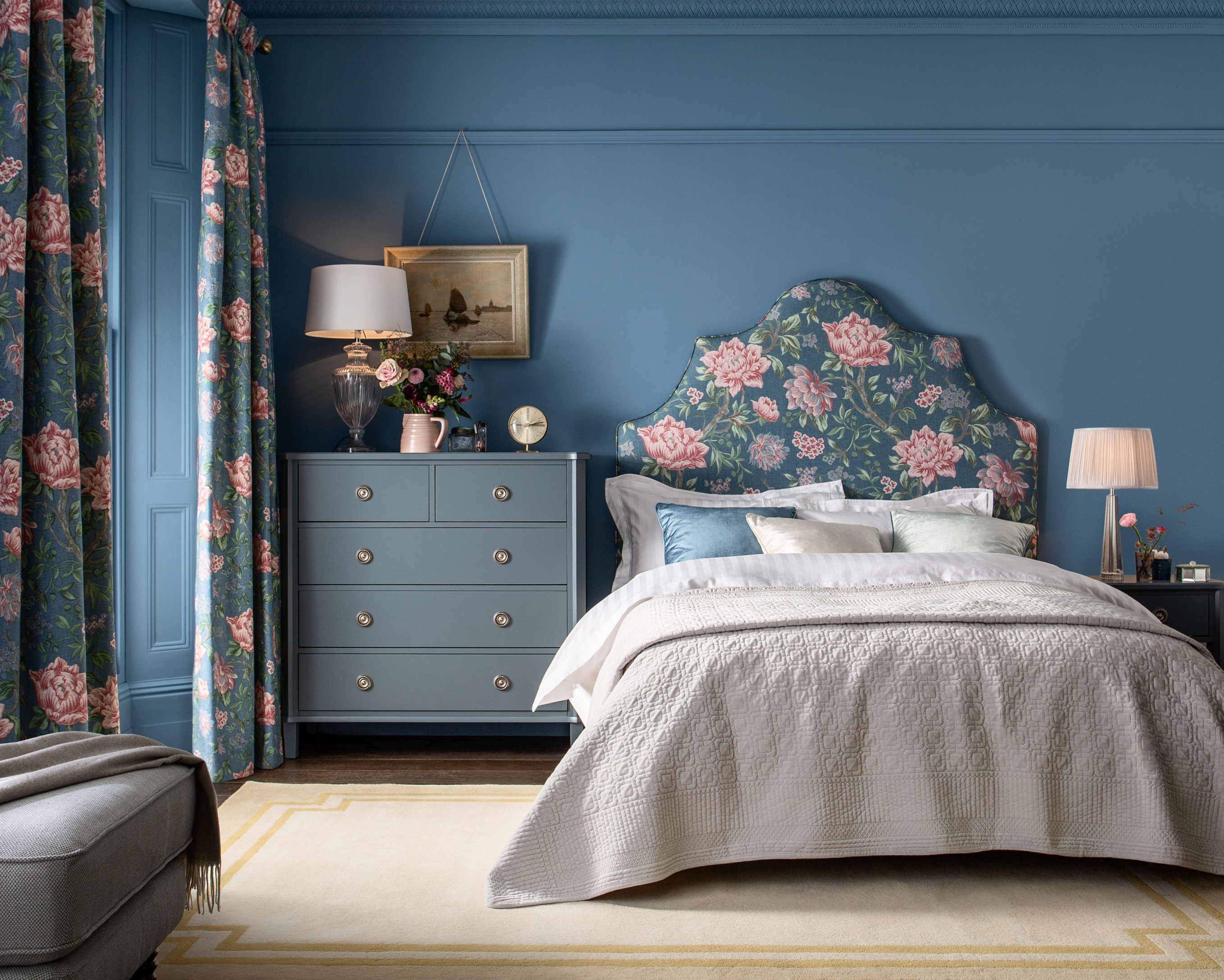 A bedroom furnished by Laura Ashley