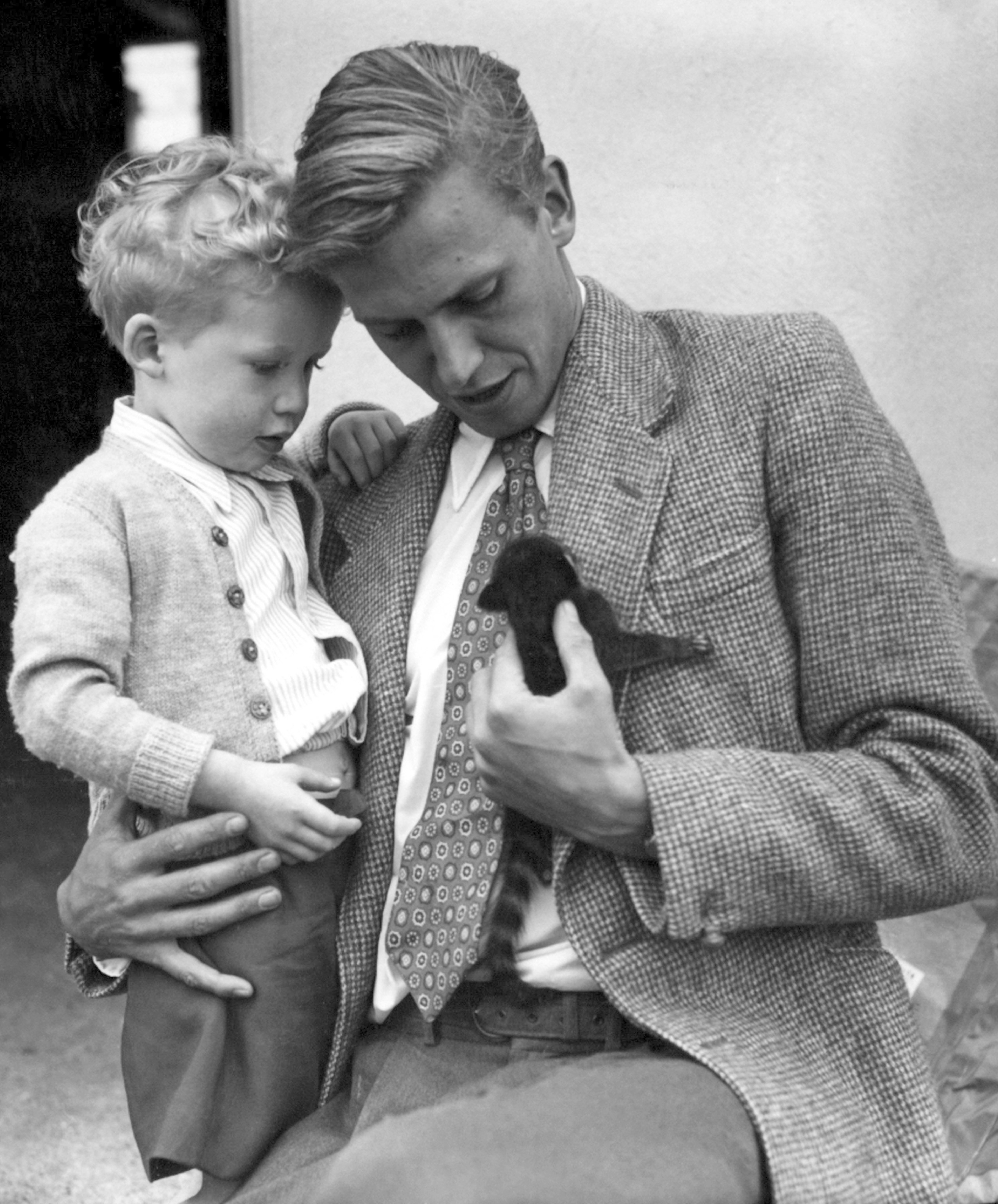 David Attenborough and his Robert with a coatimundi brought back from an expedition to British Guiana in 1955